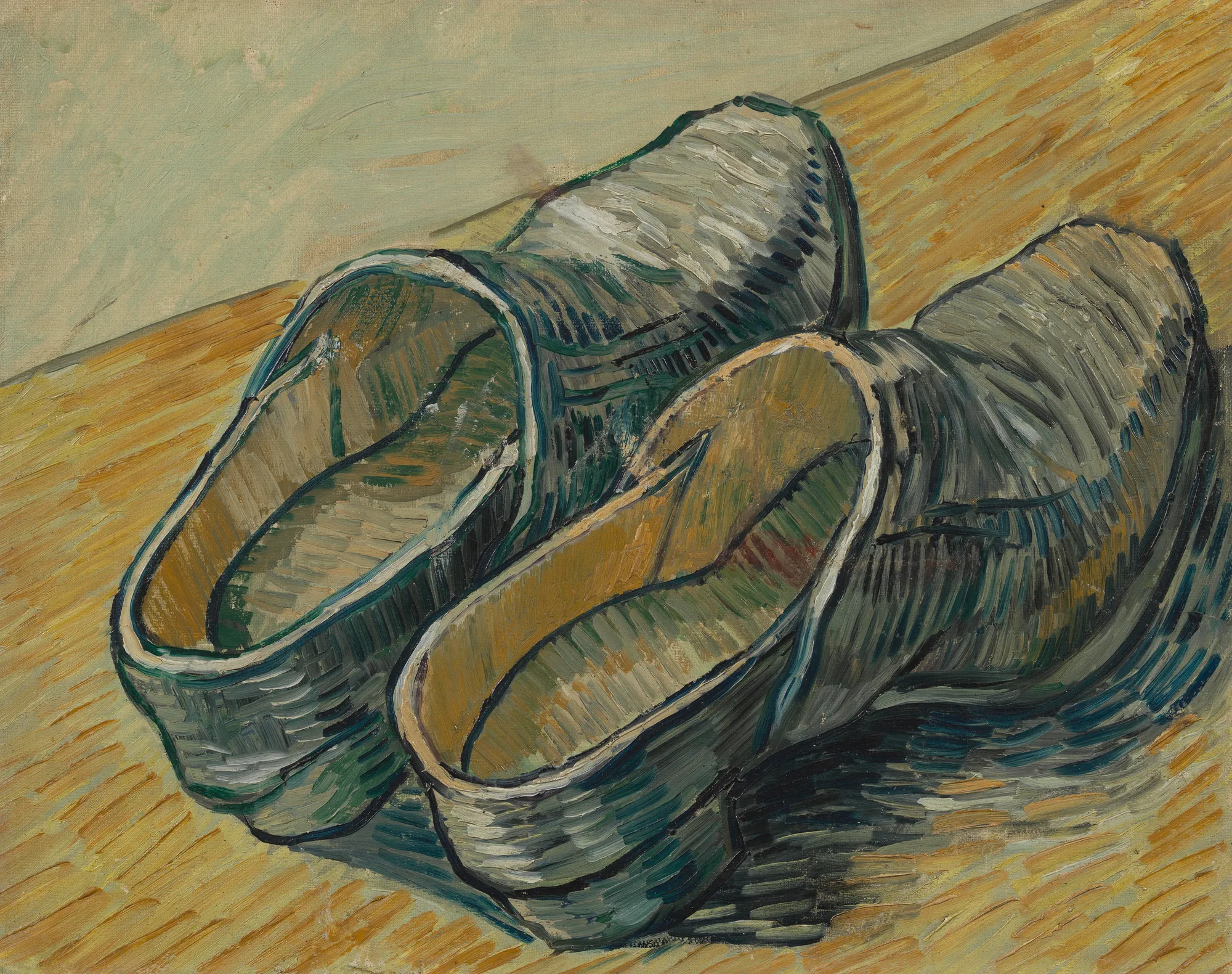 A Pair of Leather Clogs