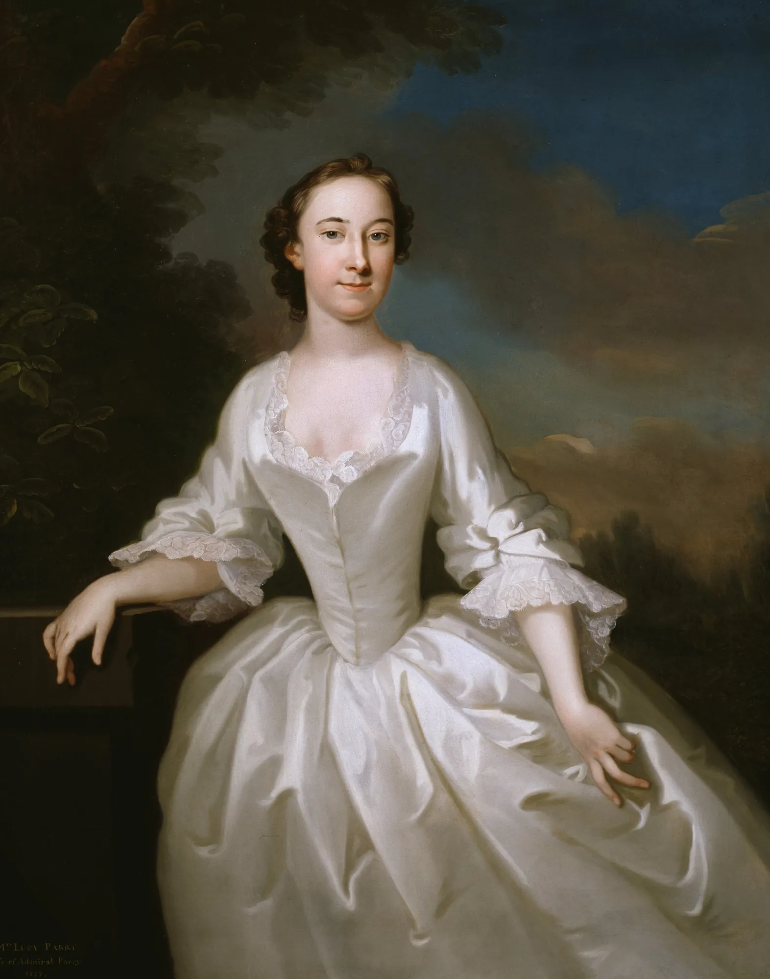 Portrait of Lucy Parry Portrait of Lucy Parry by John Wollaston the Younger. A three-quarter length portrait of an 18th-century woman in a shimmering white satin dress, set against a dark landscape and a dramatic blue sky.