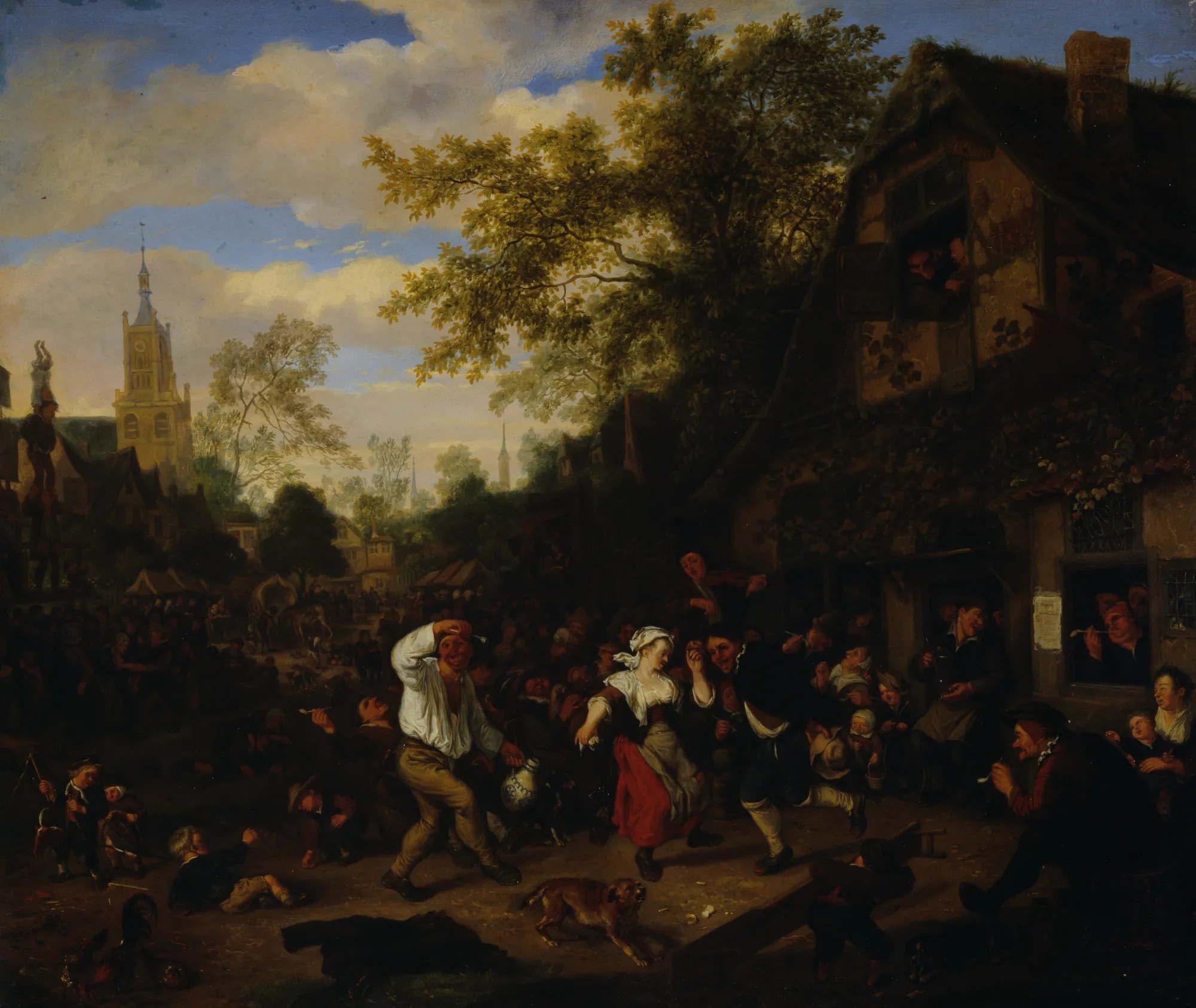 A Kermess A Kermess by Cornelis Dusart. A large crowd of figures dances and carouses outside a thatched-roof house while a church tower looms in the distant background.