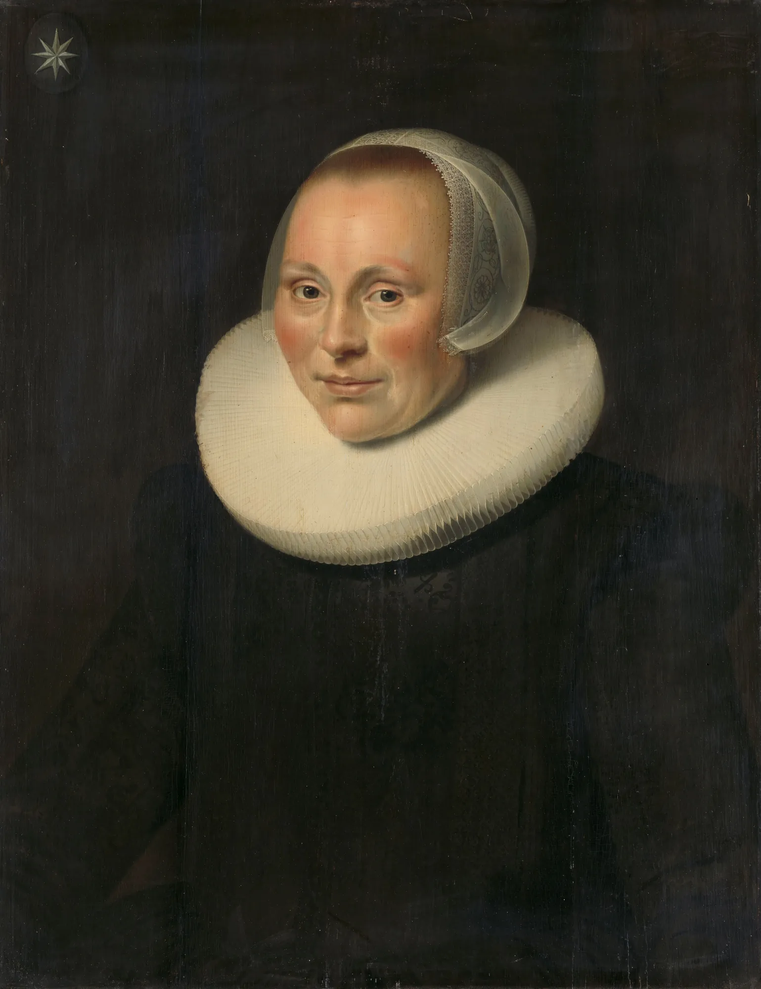 Portrait of a Woman Portrait of a Woman by Unknown Artist. A bust-length portrait of a woman wearing a large white millstone ruff collar and a delicate lace cap against a dark, atmospheric background.