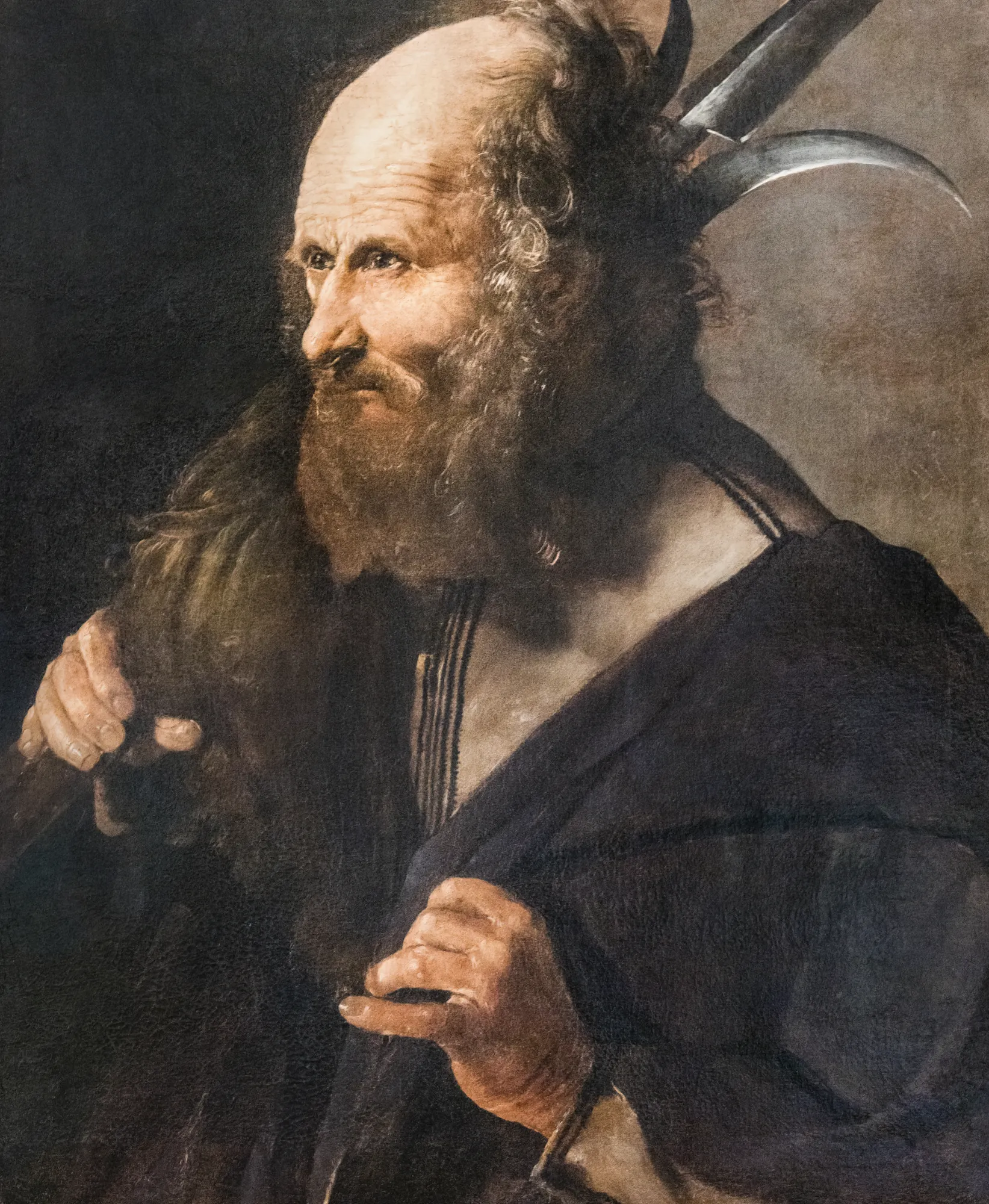 Saint Jude the Apostle Saint Jude the Apostle by Georges de La Tour. A high-contrast profile portrait of an elderly bearded man in dark robes, clutching a wooden staff against a deeply shadowed background.