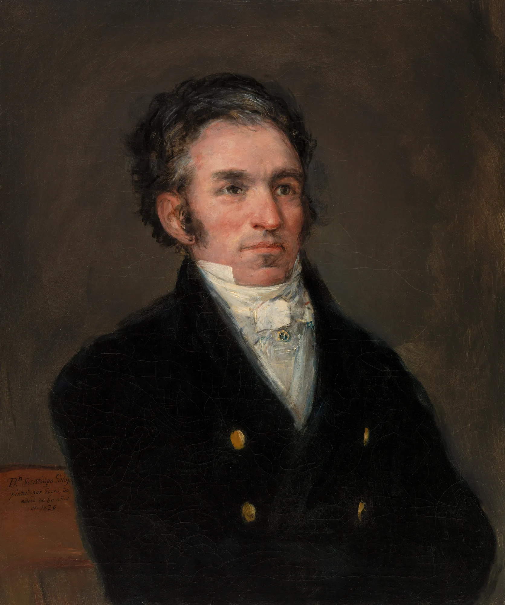 Portrait of Jacques Galos Portrait of Jacques Galos by Francisco Goya. A waist-length oil portrait of a man with dark, windswept hair wearing a black double-breasted coat and high white cravat against a dark background.