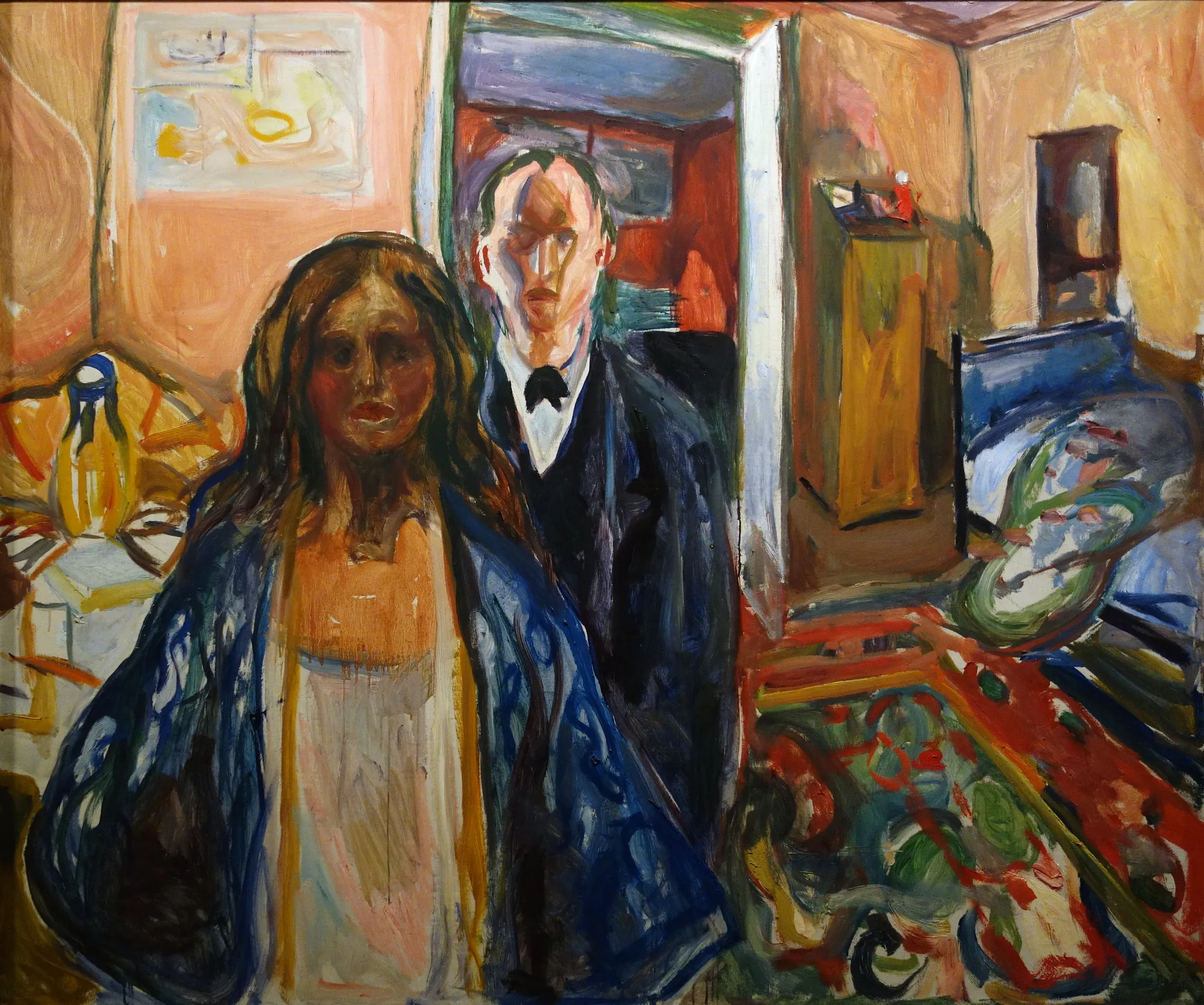 The Artist and His Model The Artist and His Model by Edvard Munch. An expressionist interior painting showing a woman in a blue patterned robe standing in front of a man in a dark suit who is positioned in a doorway.