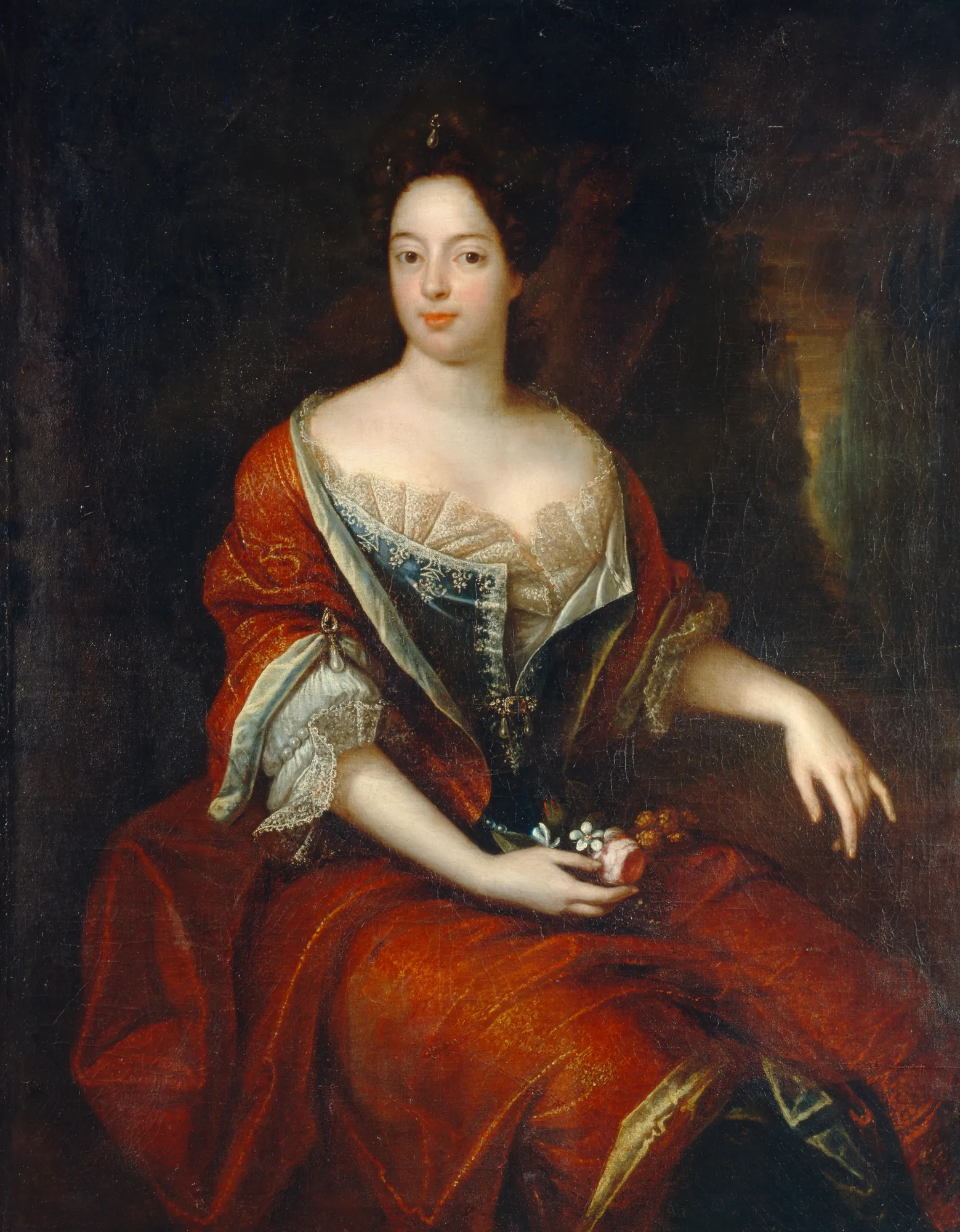 Sophie Charlotte, Queen in Prussia Sophie Charlotte, Queen in Prussia by Noël Jouvenet. A seated portrait of a woman in a rich red gown with lace detailing, holding a small bouquet of flowers.