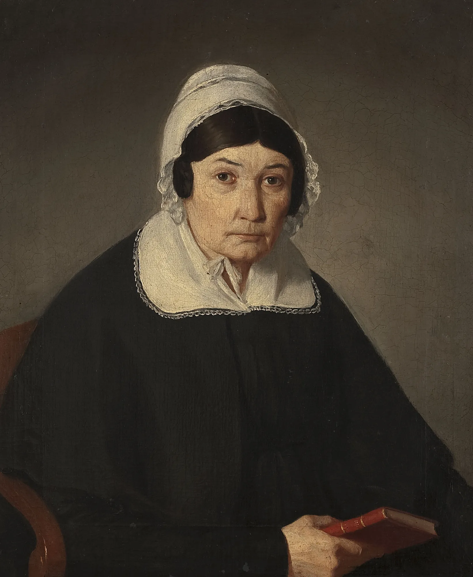Portrait of Tekla Januszkiewicz Portrait of Tekla Januszkiewicz by Adam Szemesz. A 19th-century oil portrait of an elderly woman wearing a white lace-trimmed bonnet and collar, holding a small red book.