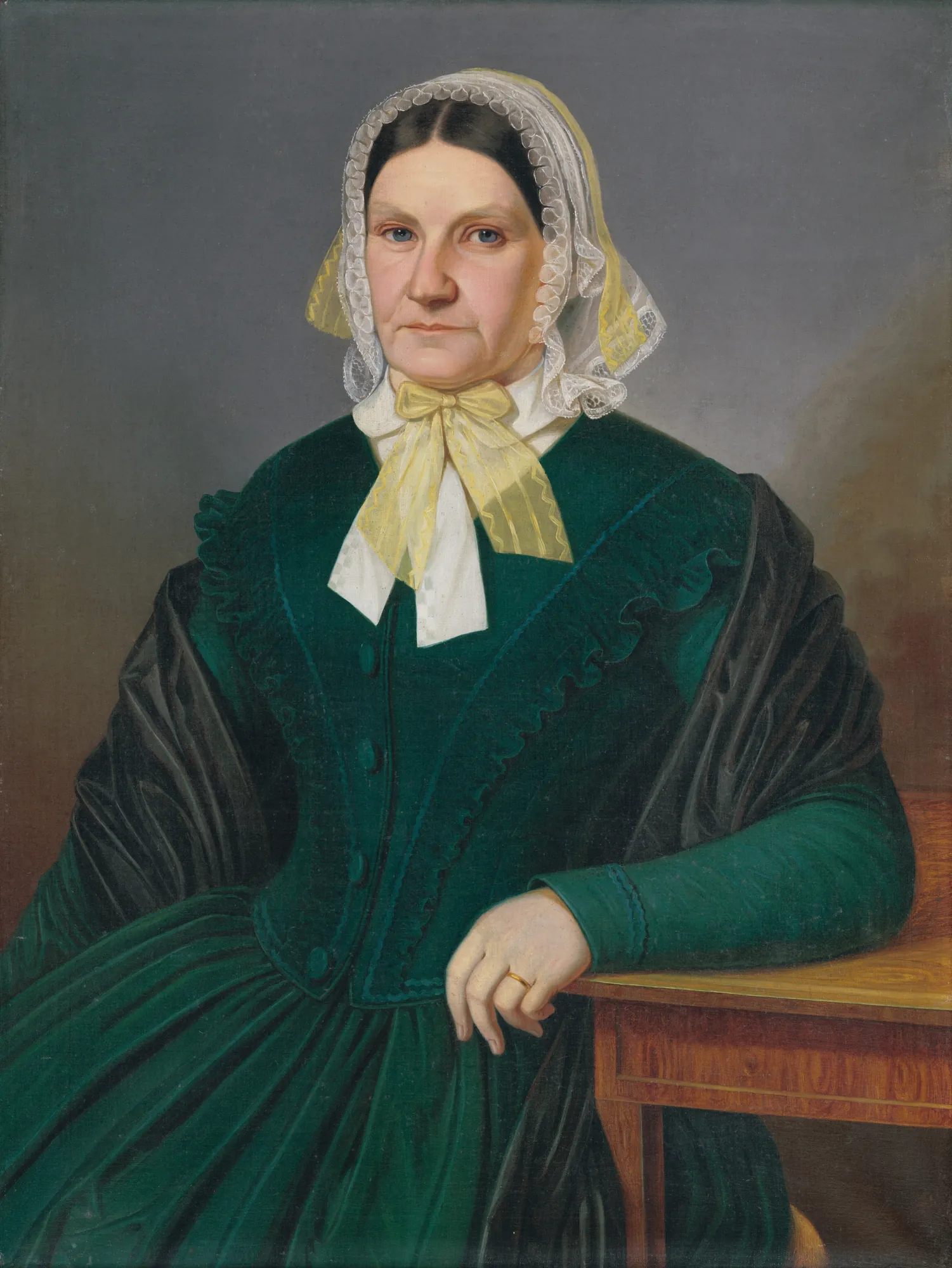 Portrait of Zuzana Dluhovitsová Portrait of Zuzana Dluhovitsová by Peter Michal Bohúň. A formal oil portrait of a woman in a rich green dress and white lace bonnet, seated at a wooden table against a dark, atmospheric background.