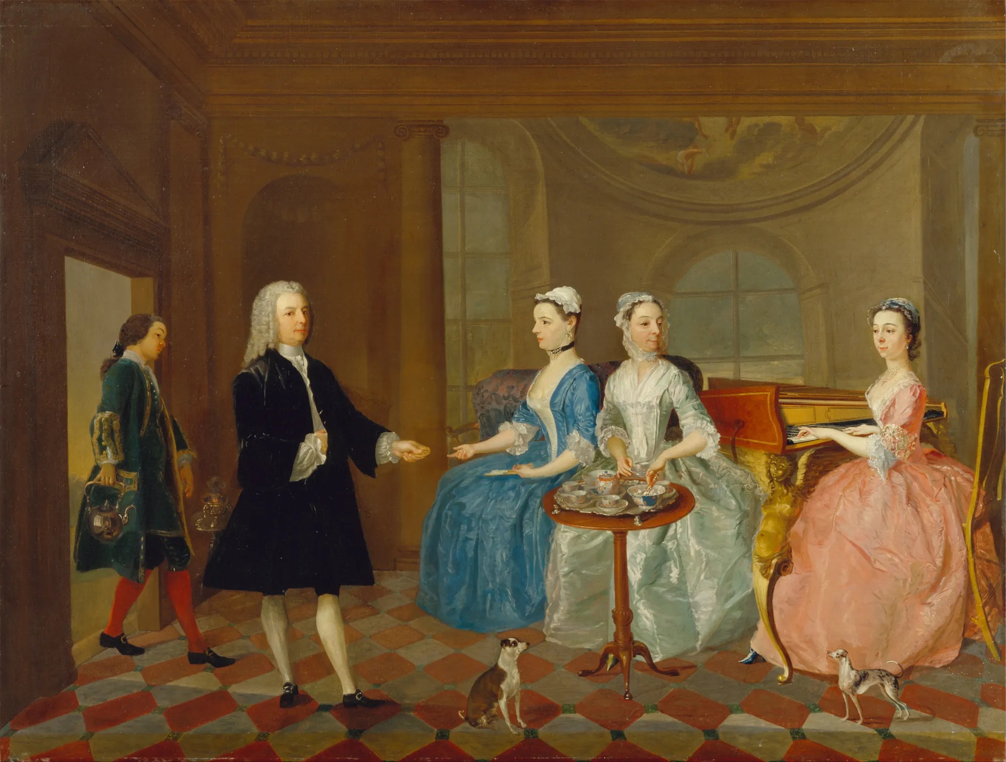 A Family Being Served with Tea