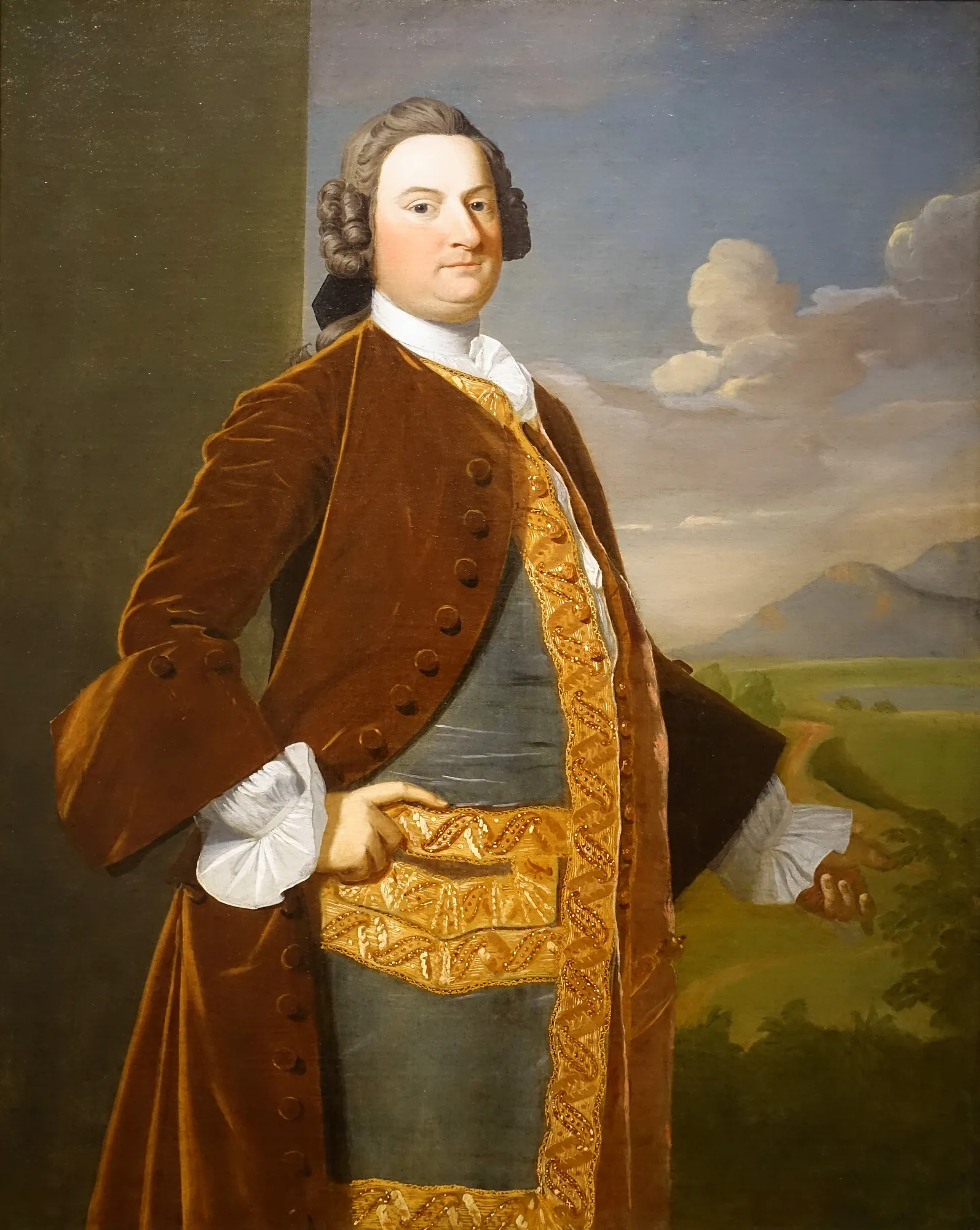 Judge Richard Saltonstall Judge Richard Saltonstall by Robert Feke. A three-quarter length formal portrait of a man in a rich brown velvet coat and gold-embroidered waistcoat standing against a landscape background.