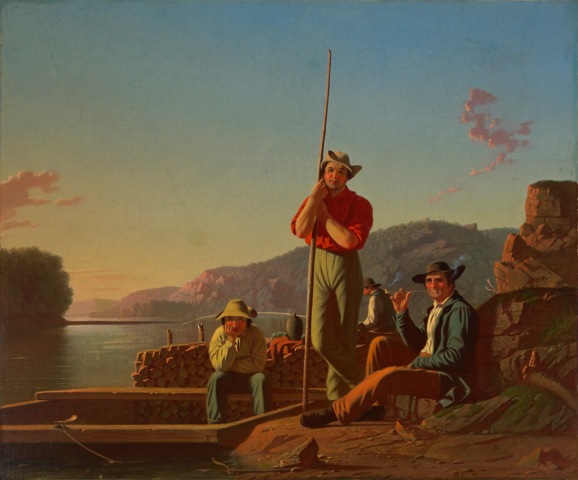 The Wood-Boat The Wood-Boat by George Caleb Bingham. A group of men rest on a flatboat and the rocky shore of a wide river during a warm-toned sunset.