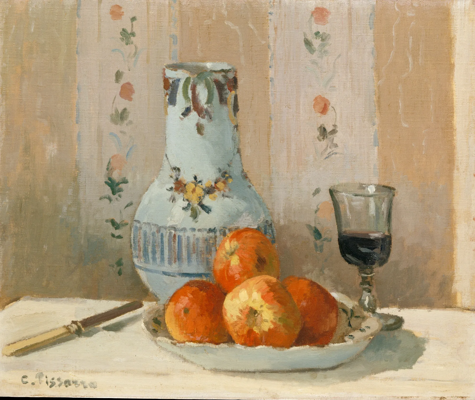 Apples and Glazed Earthenware on a Table