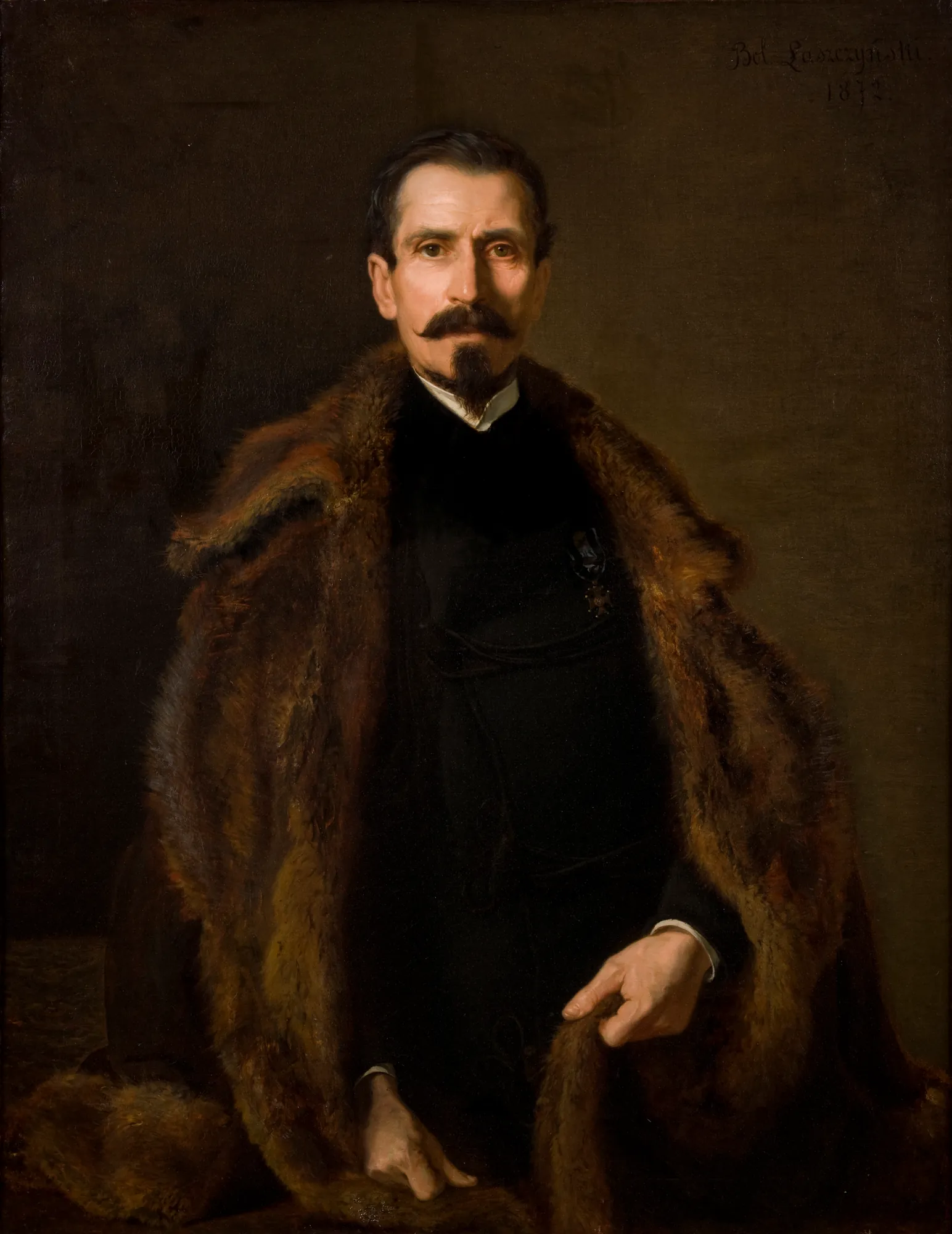 Portrait of Julian Konstanty Ordon Portrait of Julian Konstanty Ordon by Bolesław Łaszczyński. A half-length portrait of a middle-aged man with a prominent mustache and goatee, wearing a dark suit and draped in a heavy fur-lined coat.