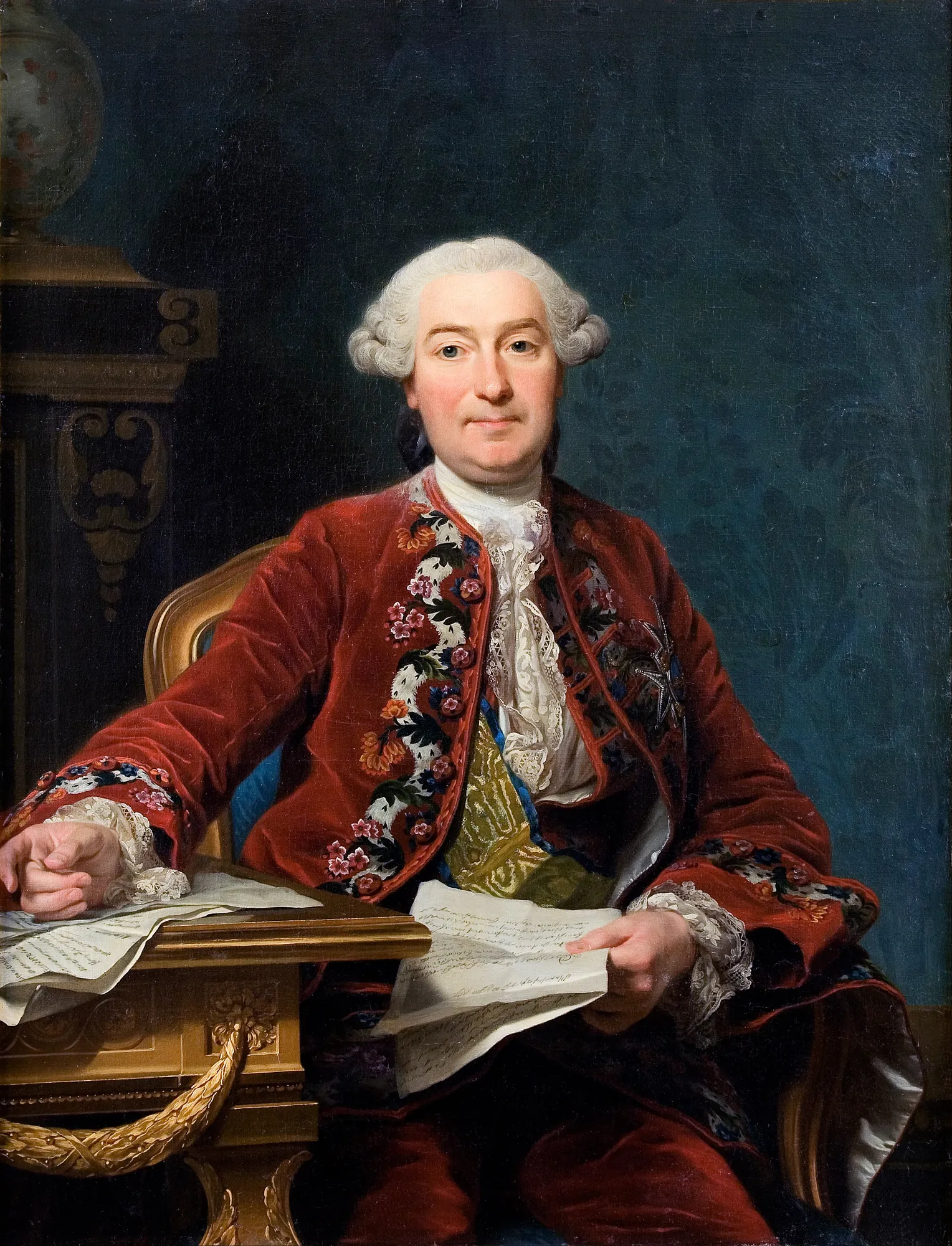Ulrik Scheffer Ulrik Scheffer by Alexander Roslin. A seated man with a powdered wig wears a lavishly embroidered red velvet coat and holds papers at a desk against a dark blue background.