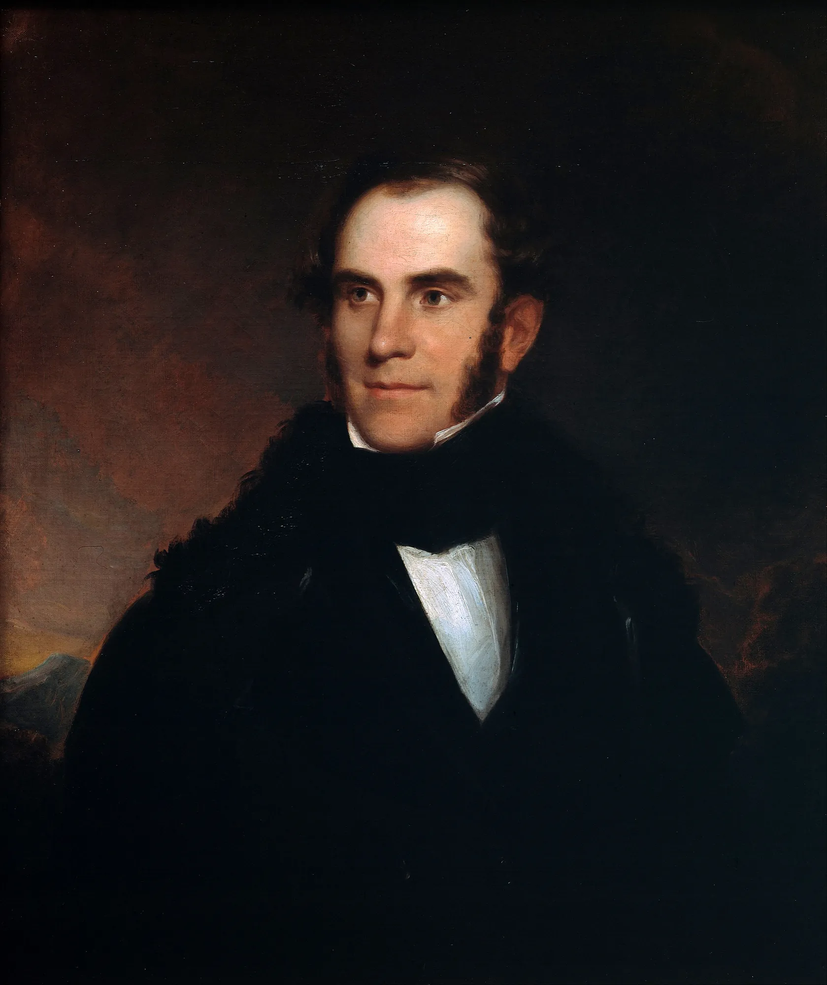 Portrait of Thomas Cole Portrait of Thomas Cole by Asher Brown Durand. A formal oil portrait of a man with dark hair and sideburns, wearing a black coat with a fur collar against a dark, atmospheric background.