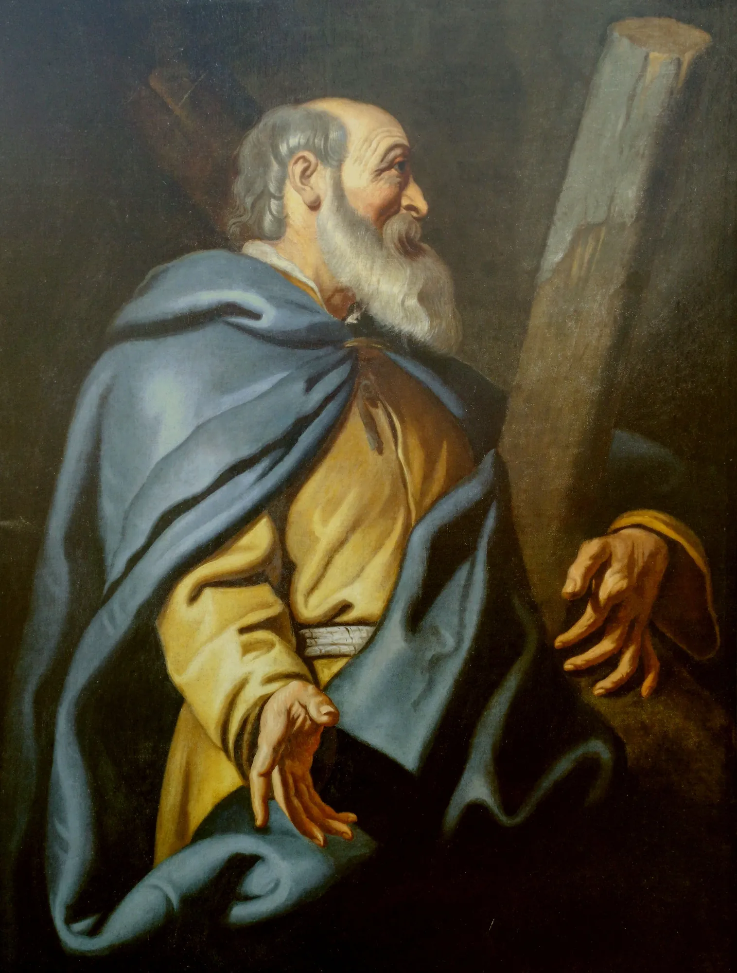 Apostle Andrew Apostle Andrew by Unknown Artist. A bearded man in flowing blue and yellow robes leans thoughtfully against a large wooden cross against a dark background.