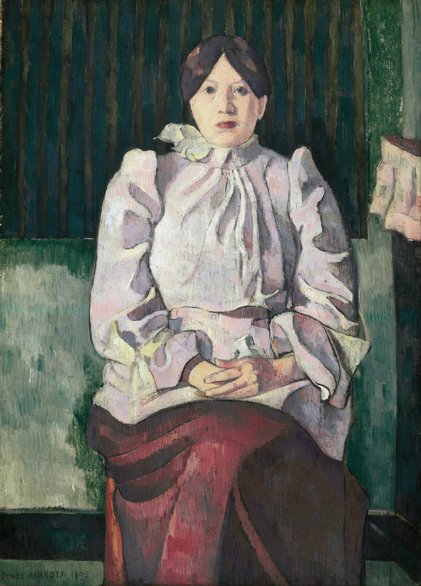Portrait of Marie Lemasson Portrait of Marie Lemasson by Émile Bernard. A woman with dark hair and a high-collared lavender blouse sits with her hands folded against a dark, vertically striped background.
