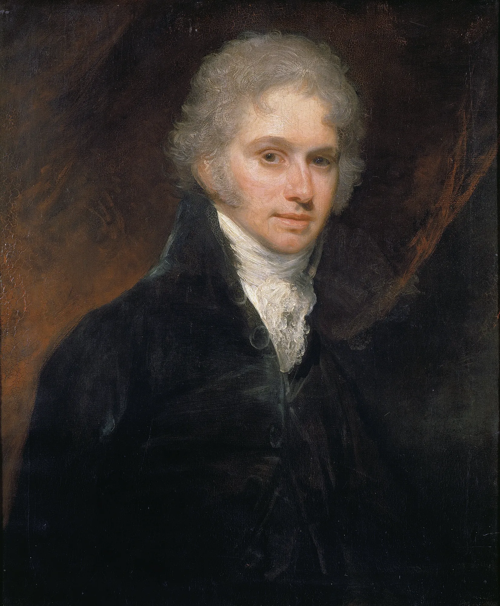 Charles Small Pybus Charles Small Pybus by William Beechey. A half-length portrait of a young man with powdered hair, wearing a high-collared dark coat and a white lace cravat against a dark, atmospheric background.