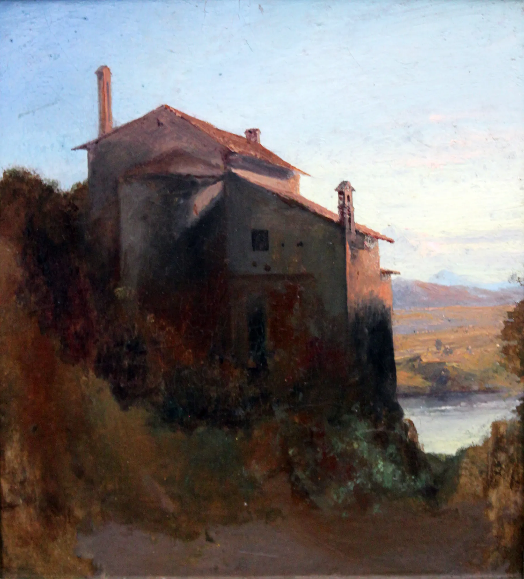 Italian Monastery Building on the Water's Edge Italian Monastery Building on the Water's Edge by Carl Blechen. A stone monastery building with a red-tiled roof sits atop a steep, shaded cliff overlooking a calm body of water at dusk or dawn.