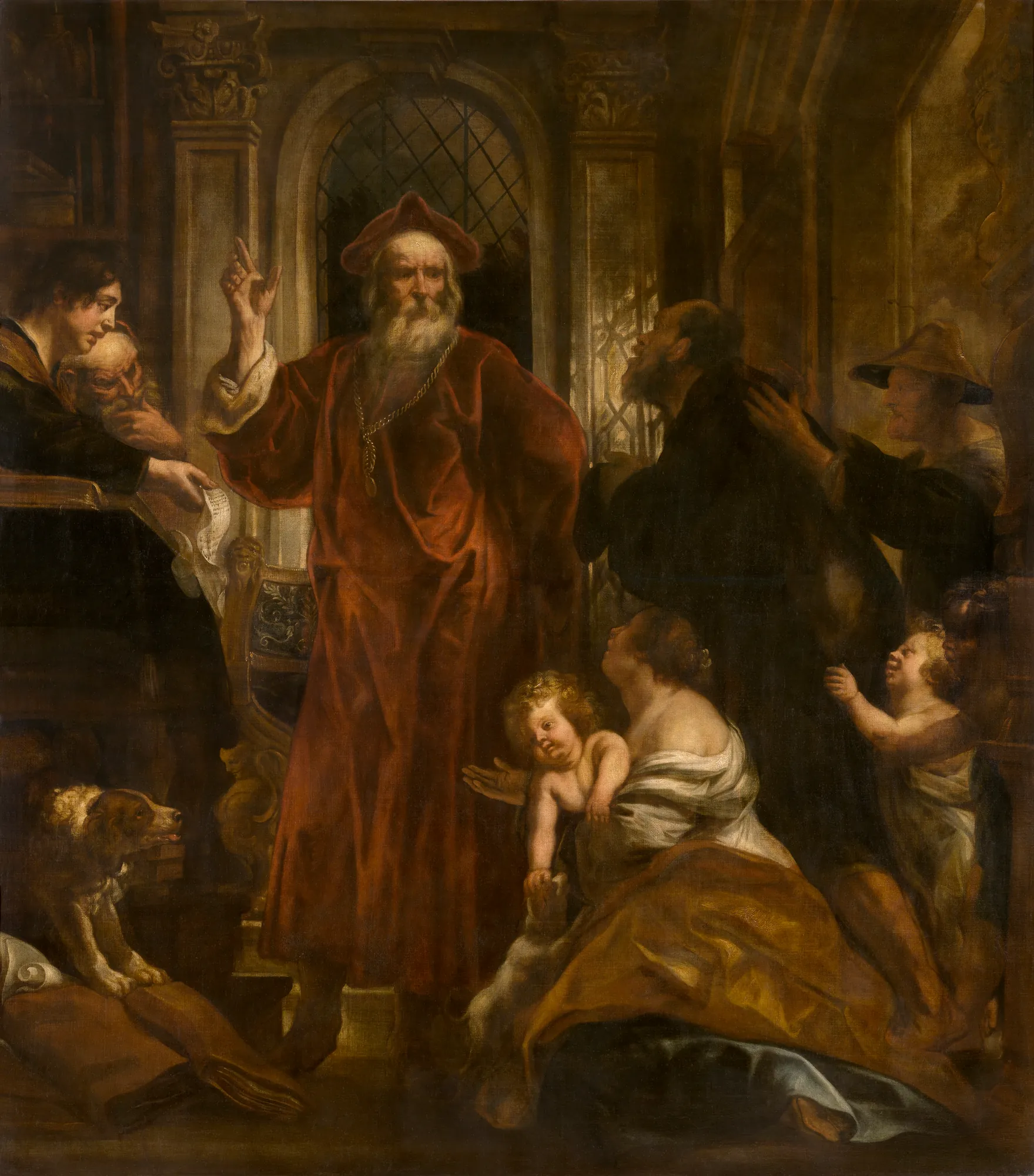 Saint Ivo of Brittany Saint Ivo of Brittany by Jacob Jordaens. A central bearded man in a vibrant red robe and cap gestures with one hand raised while surrounded by a group of figures, including a woman holding a child and a dog, within a grand hall.