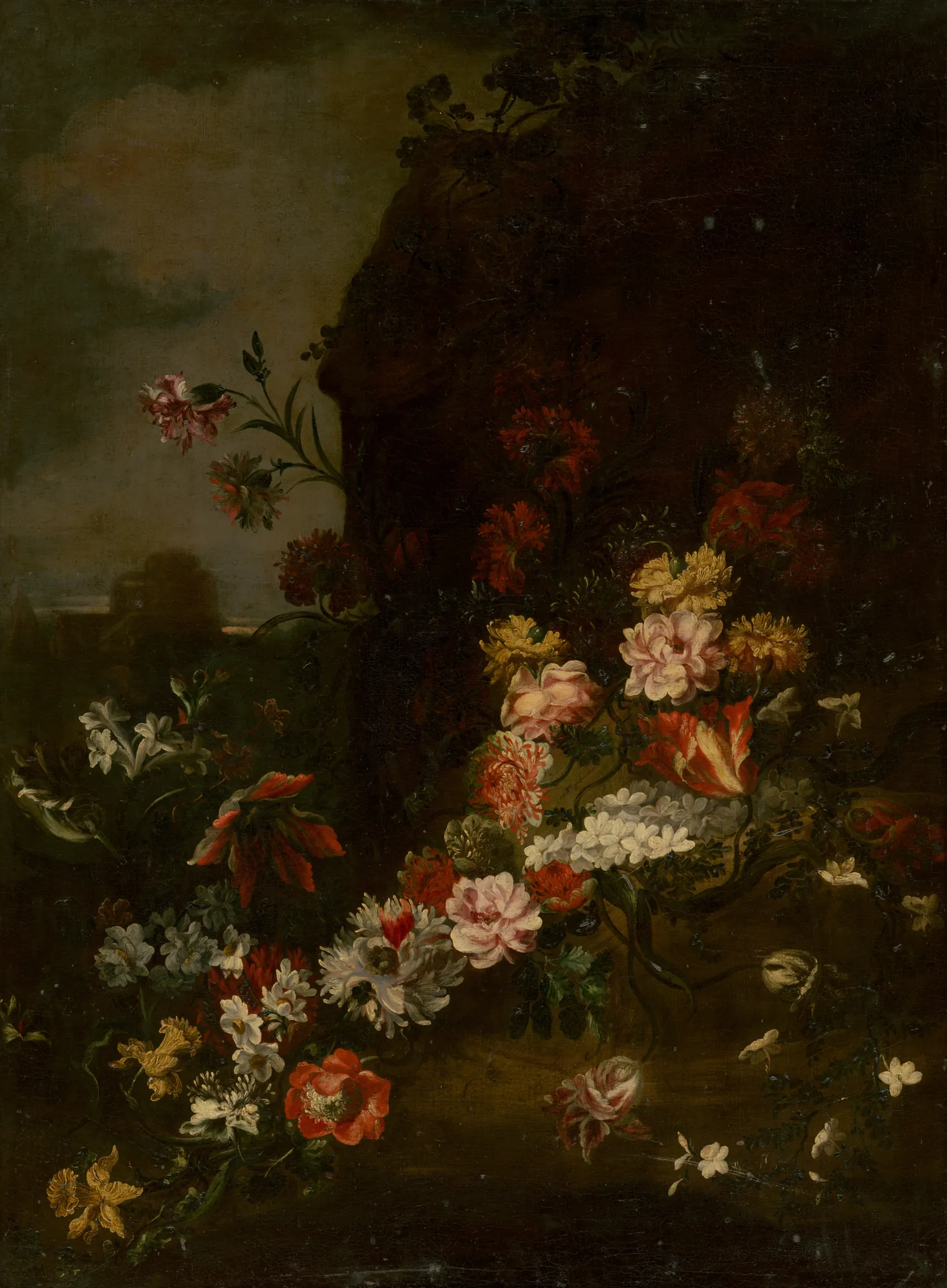 Flower Still Life in Nature Flower Still Life in Nature by Unknown Artist. A rich arrangement of colorful flowers, including tulips and carnations, set against a dark, rocky landscape under a somber sky.