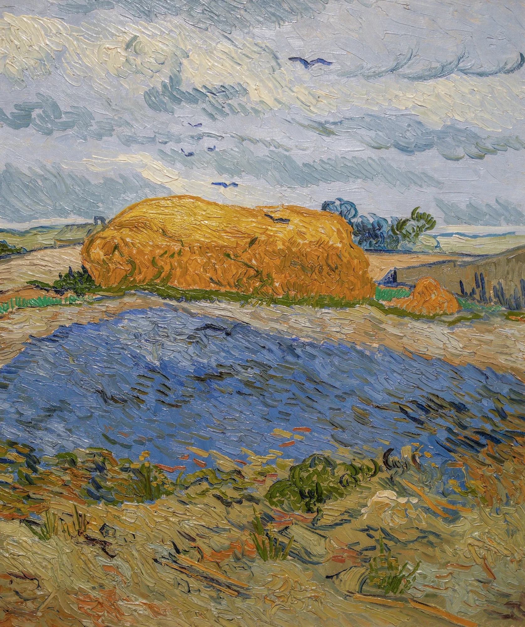 Haystacks under a Rainy Sky