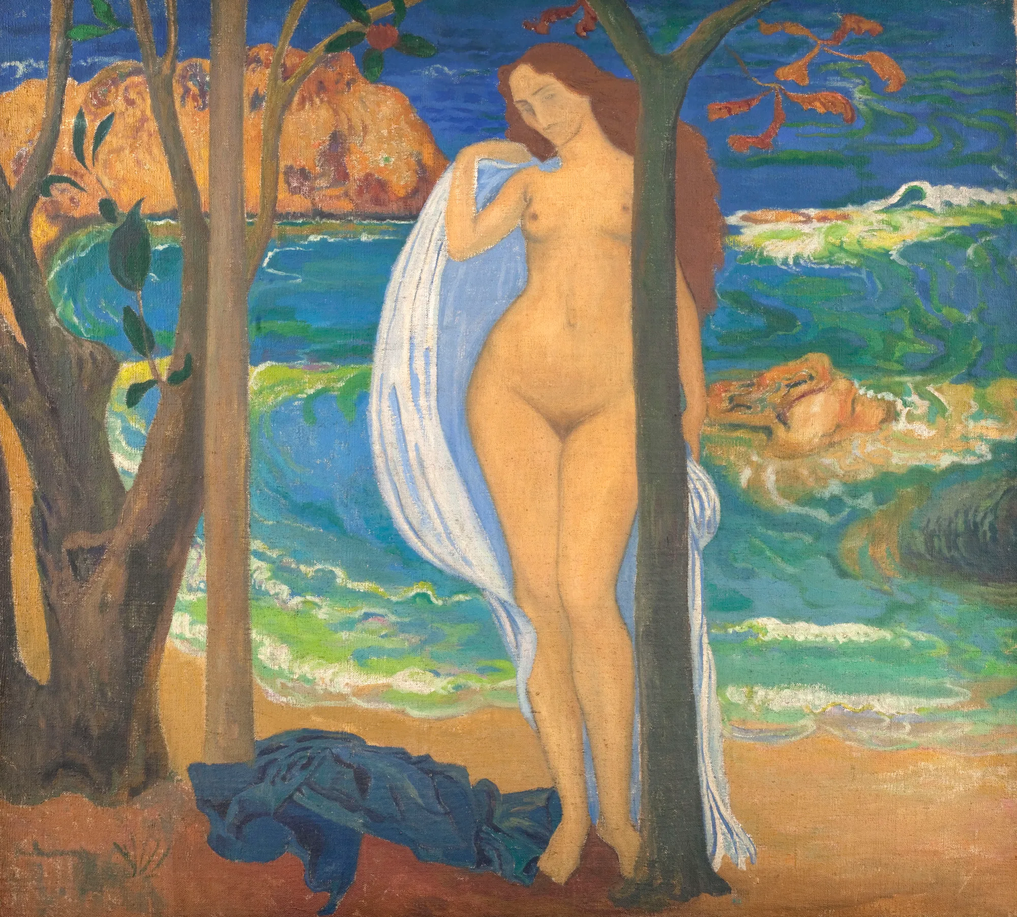 Méditerranée Méditerranée by Aristide Maillol. A nude woman stands on a sandy shore framed by two slender trees, with blue waves and a rocky headland in the background.