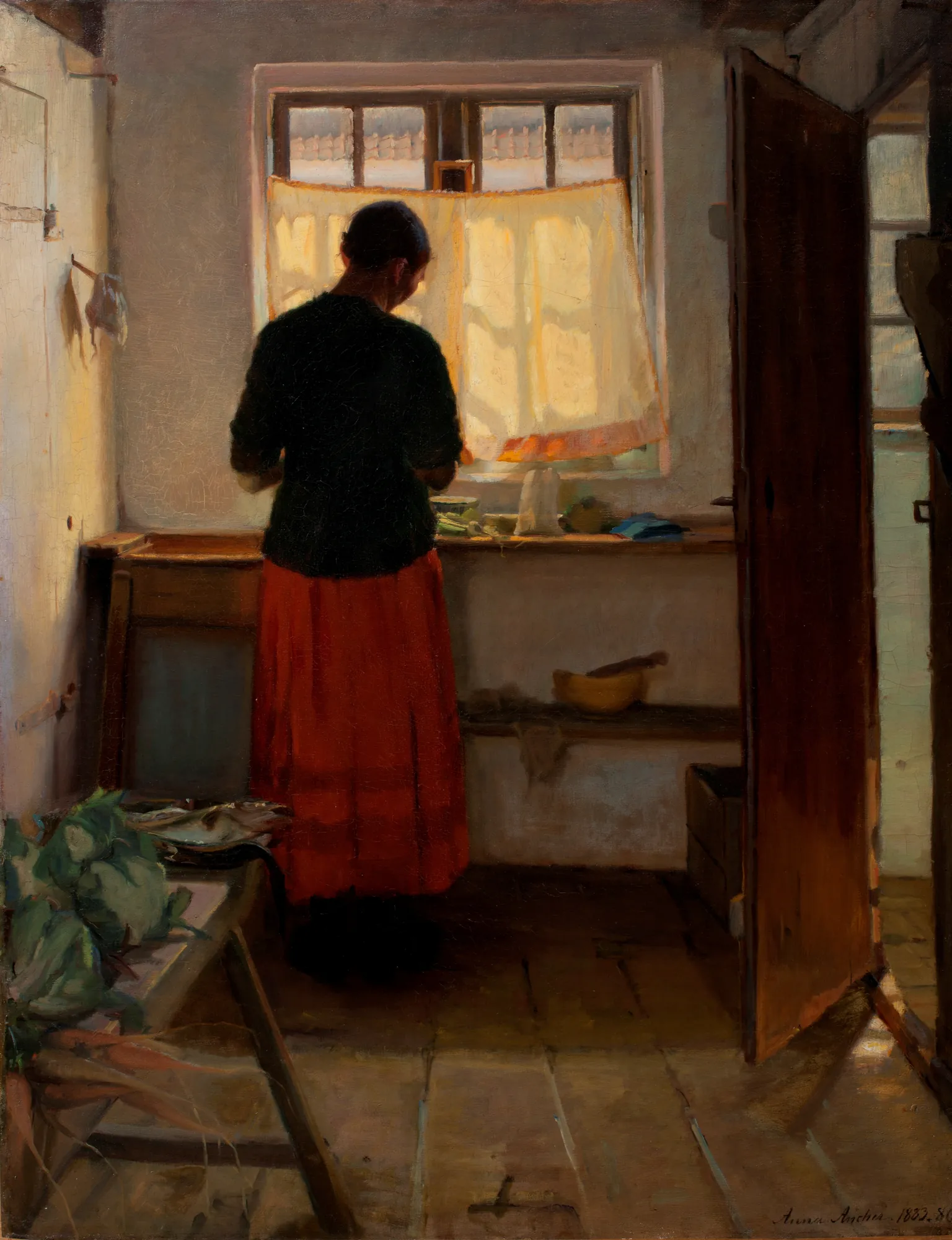 The Maid in the Kitchen The Maid in the Kitchen by Anna Ancher. A woman seen from behind in a black blouse and bright red skirt stands before a window where warm sunlight filters through a sheer yellow curtain.