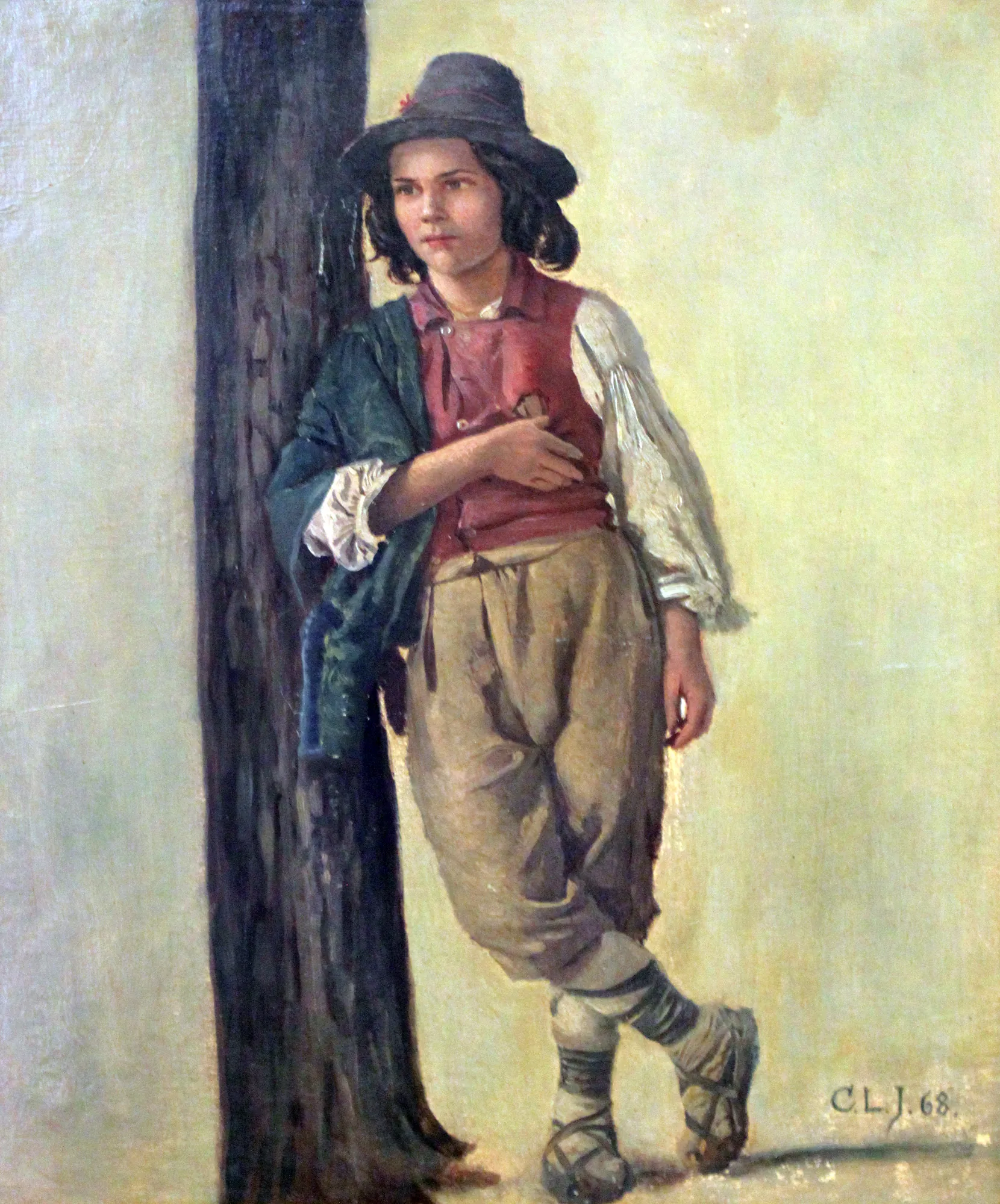 Italian Shepherd Boy Italian Shepherd Boy by Carl Ludwig Jessen. A full-length portrait of a young boy in traditional Italian clothing leaning against a dark tree trunk.