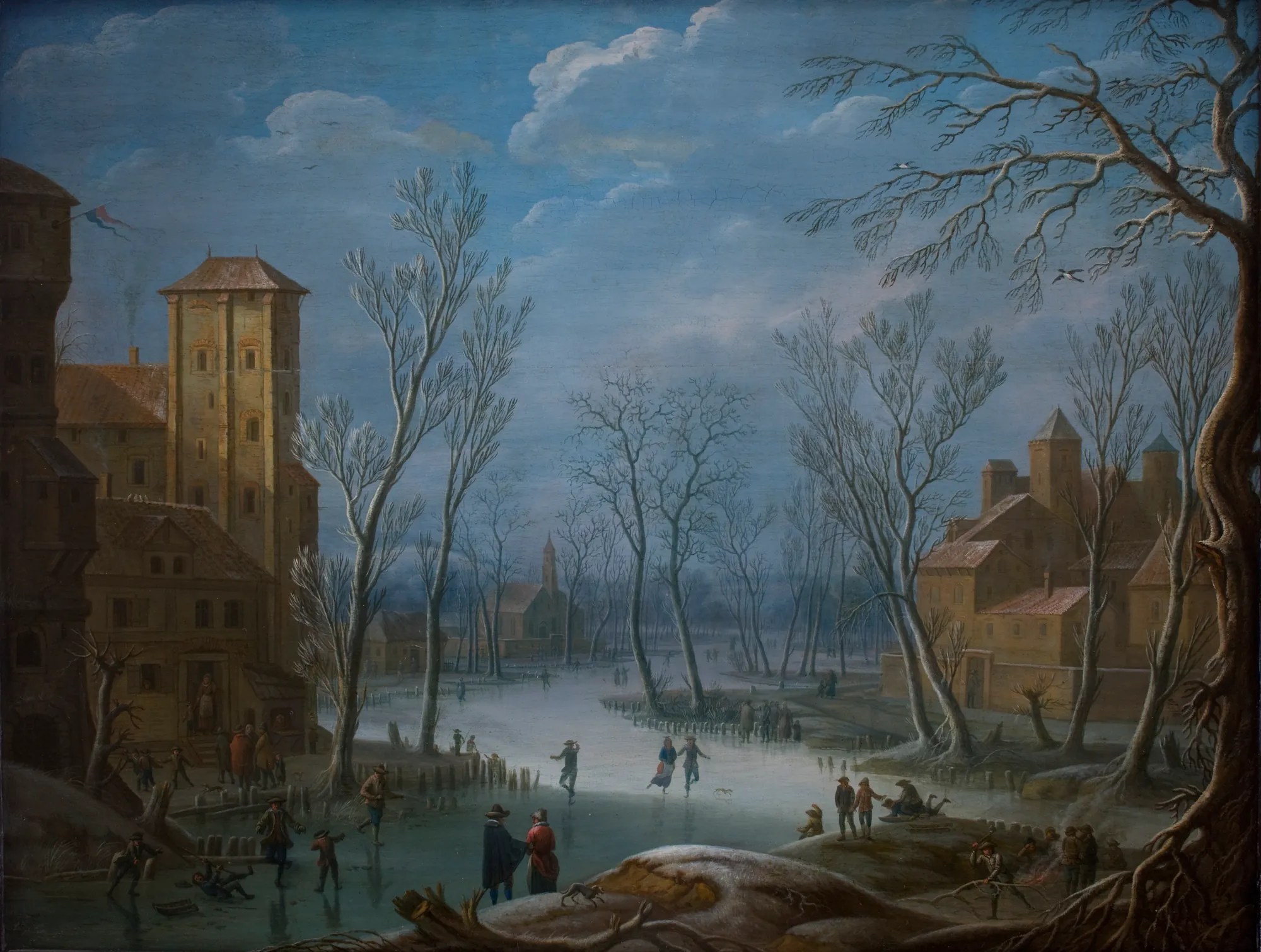 The Ice Rink The Ice Rink by Unknown Artist. A bustling winter landscape featuring many small figures skating on a frozen river amidst snow-dusted buildings and bare trees.