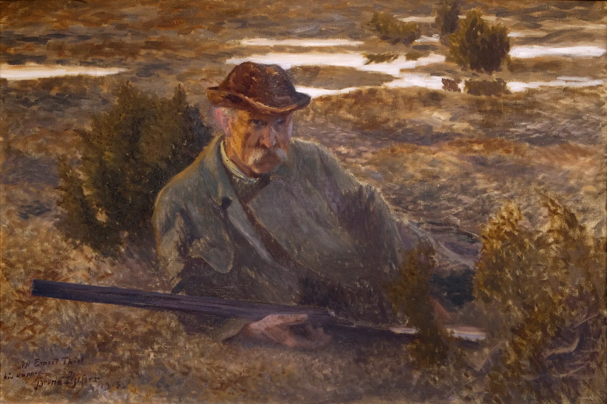 Self-portrait Self-portrait by Bruno Liljefors. A man with a mustache wearing a brown hat and grey coat holds a rifle while seated in a rugged, brush-filled landscape under low light.