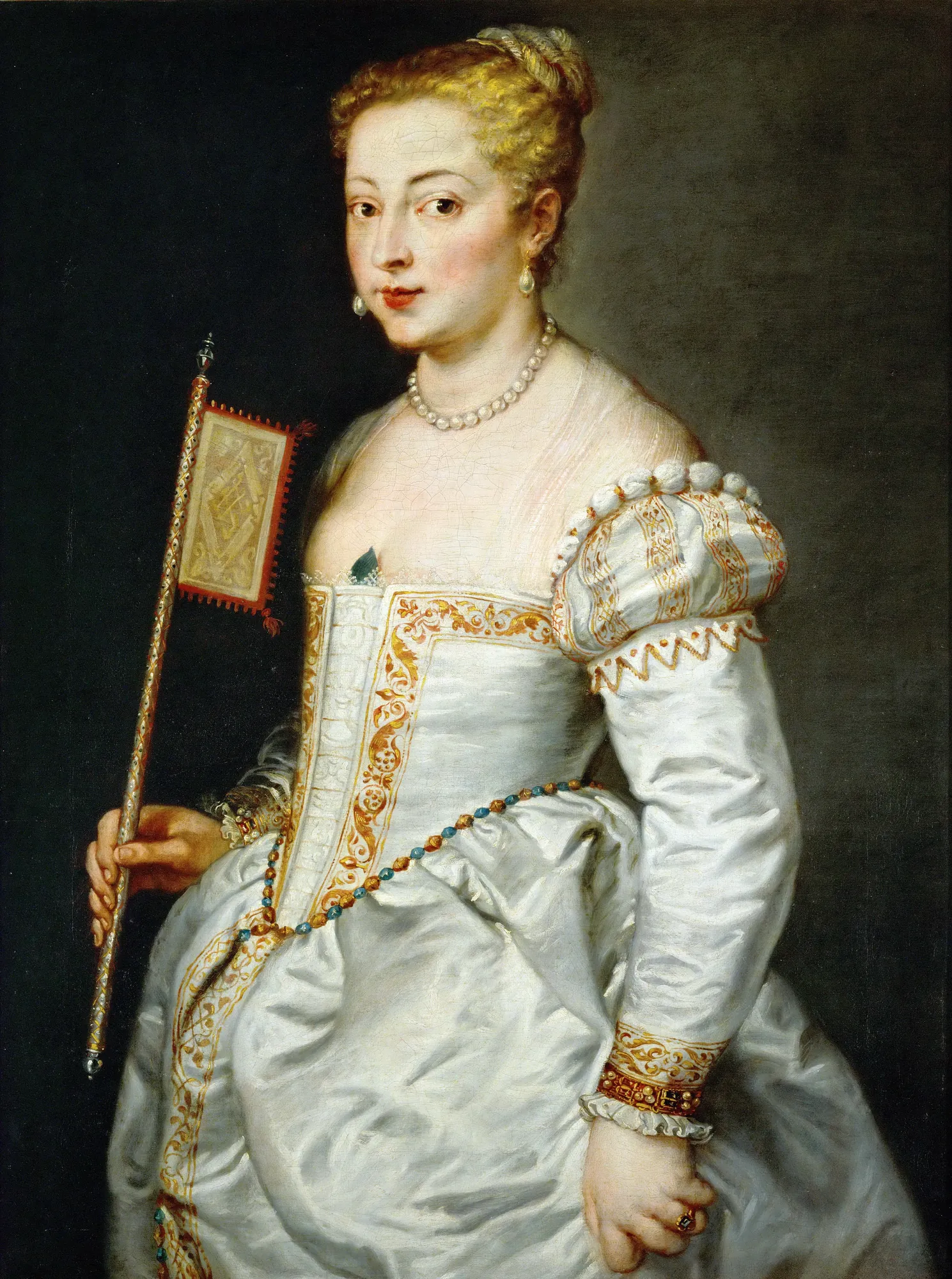 Girl with a Fan (Lady in White) Girl with a Fan (Lady in White) by Peter Paul Rubens. A three-quarter length oil portrait of a fair-skinned young woman in a detailed white gown with gold embroidery, pearls, and a rectangular fan.