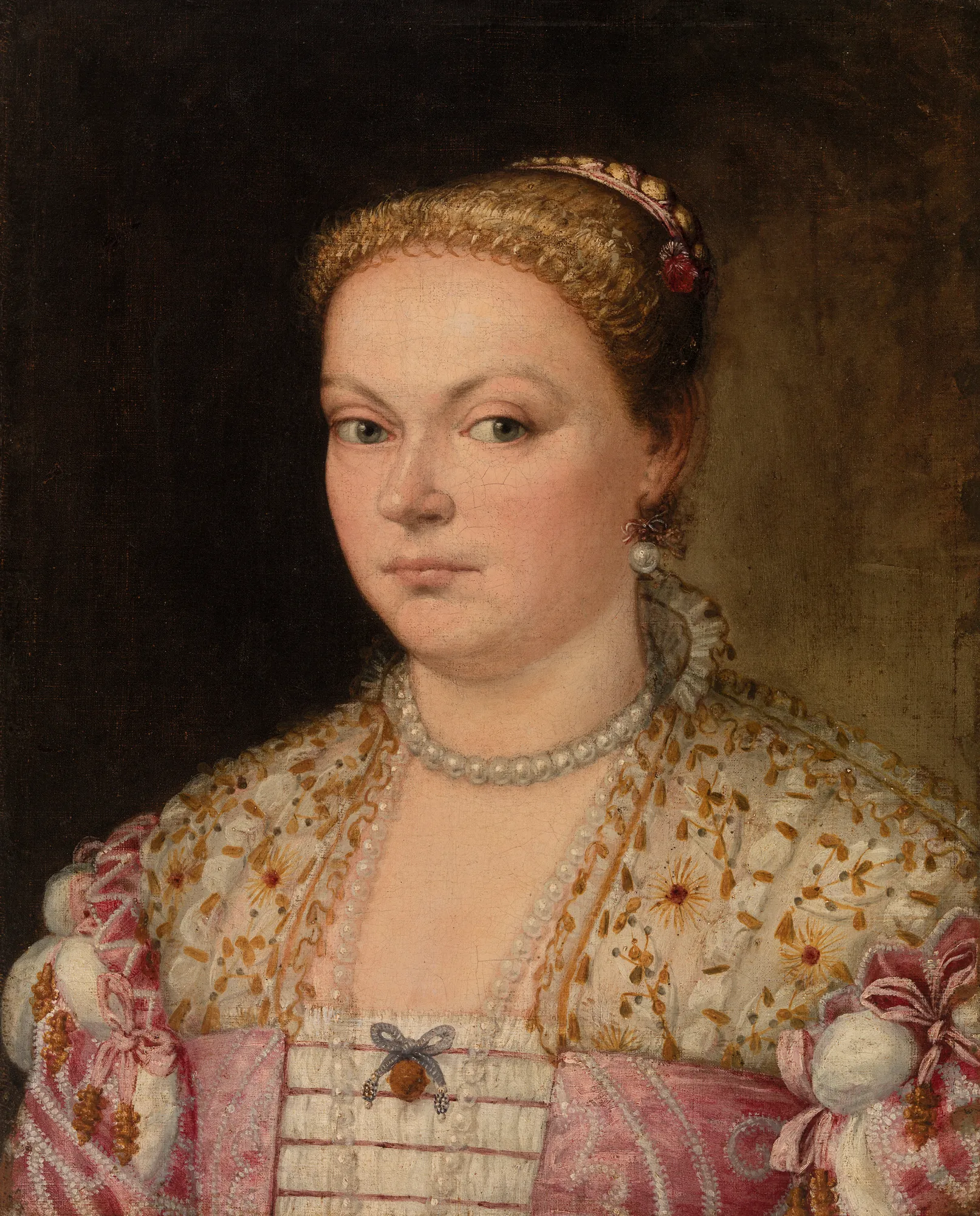 Portrait of a Lady Portrait of a Lady by Paolo Veronese, Parrasio Micheli. A three-quarter portrait of a woman with light hair and a pearl earring, wearing a lavishly embroidered white and pink dress adorned with pearls.