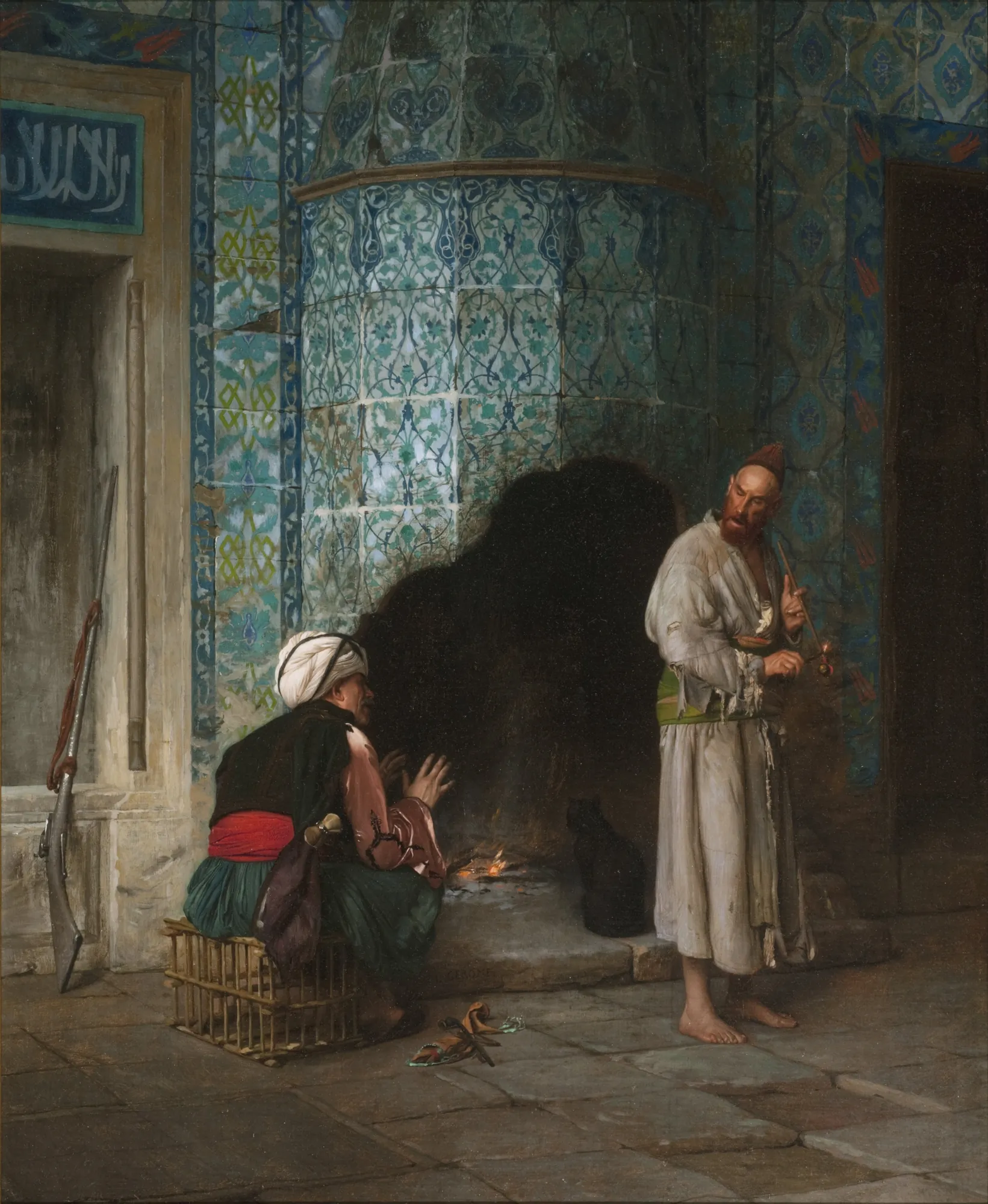 A Chat by the Fireside A Chat by the Fireside by Jean-Léon Gérôme. Two men in traditional Middle Eastern attire are shown in a room featuring vibrant blue and green Iznik-style tiles, one warming his hands by a dark hearth and the other standing with a pipe.