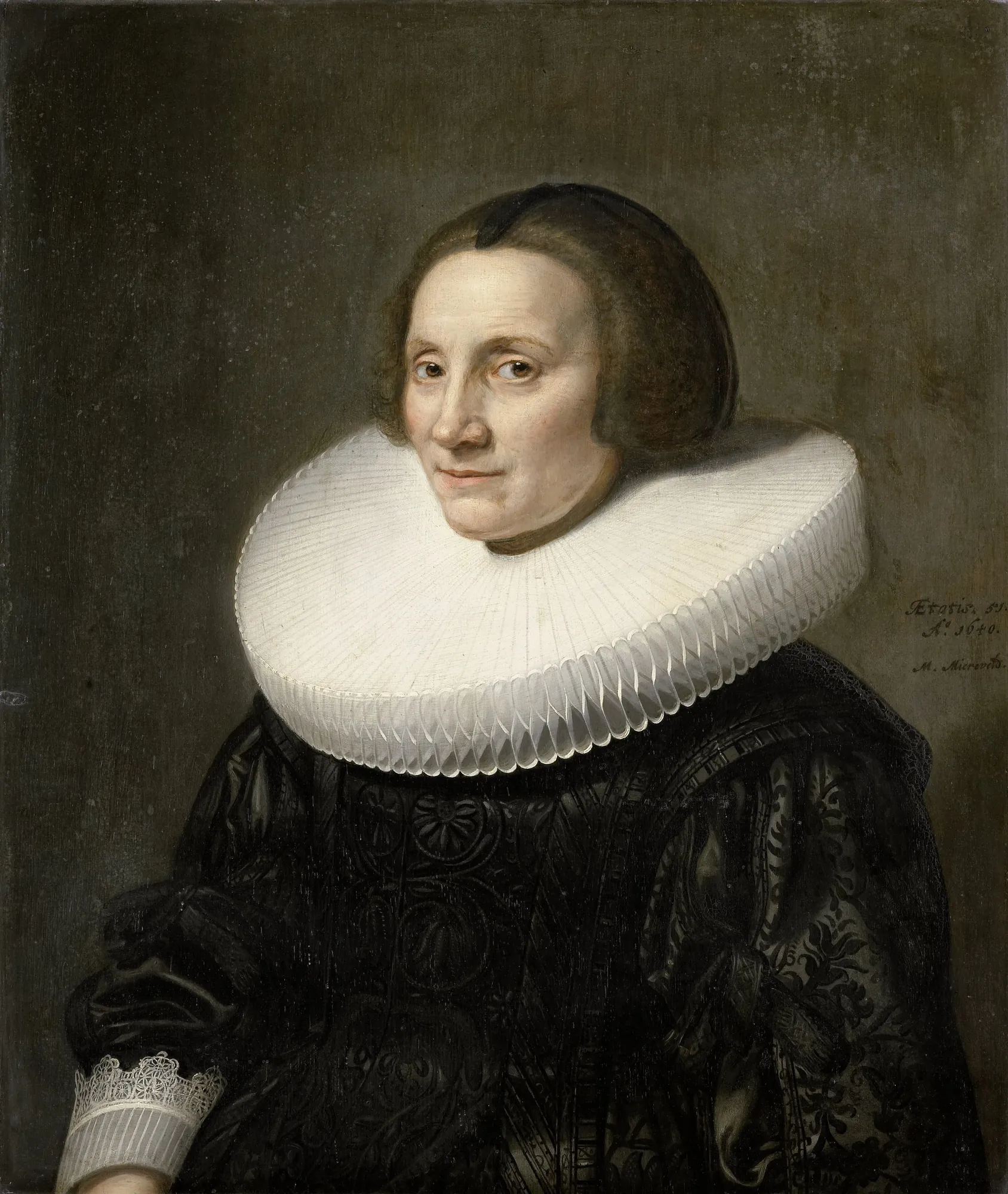 Portrait of Caecilia van Beresteyn Portrait of Caecilia van Beresteyn by Michiel Jansz. van Mierevelt. A three-quarter portrait of an older woman in a black patterned dress and a large, crisp white millstone ruff.