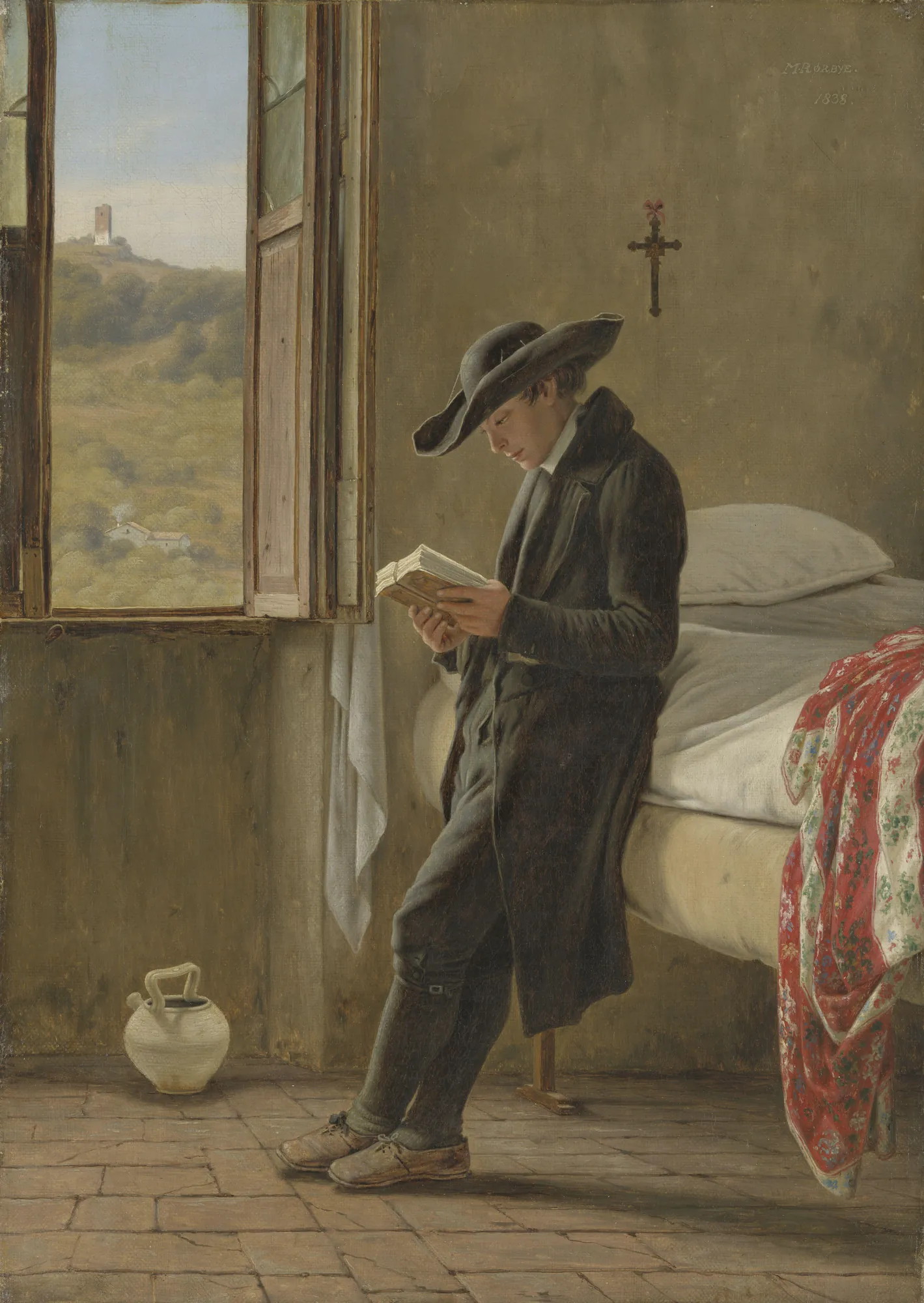 Young Priest Reading