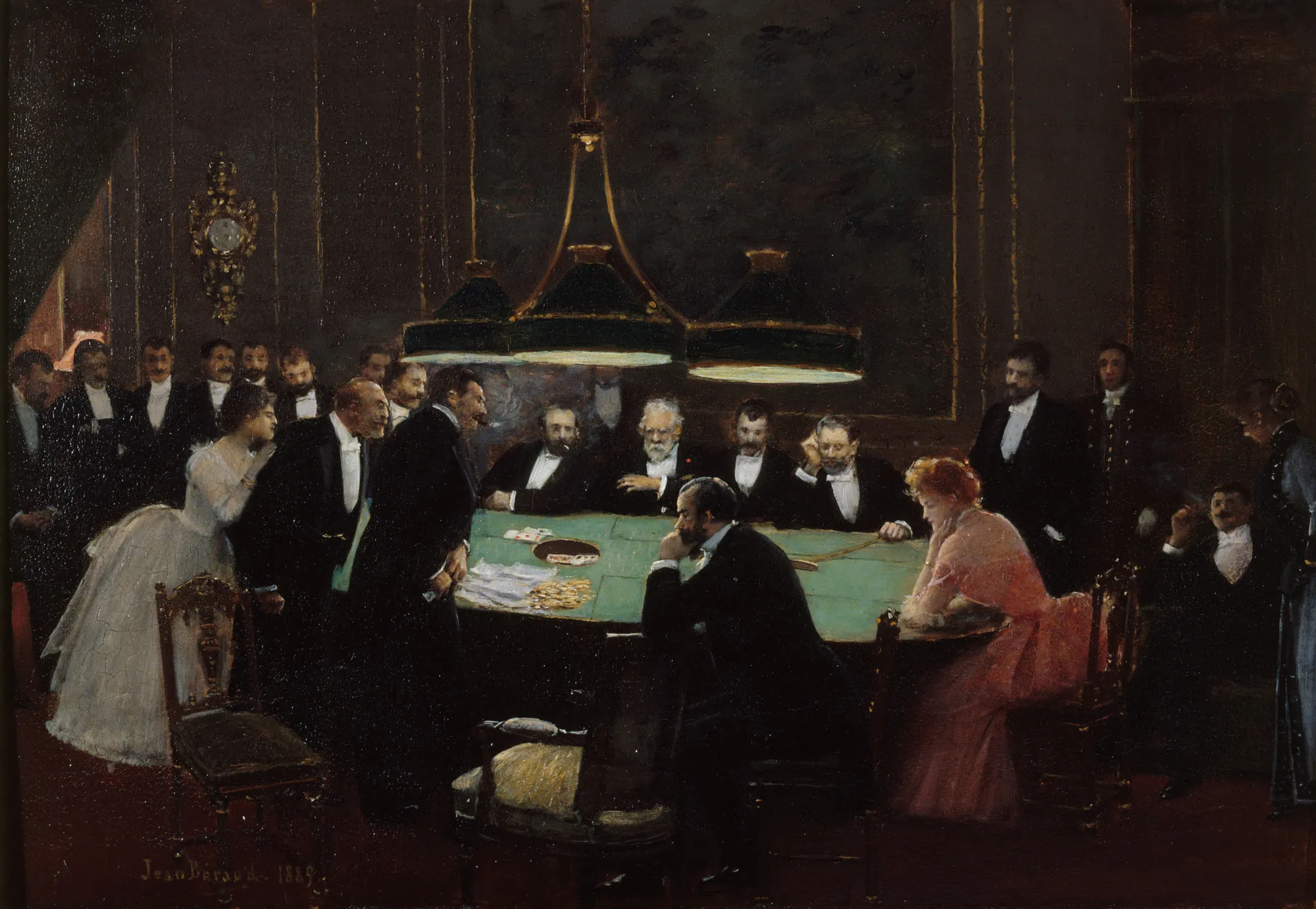 La salle de jeu La salle de jeu by Jean Béraud. A group of elegantly dressed men and women gather around a green-topped gambling table illuminated by three low-hanging lamps in a dimly lit room.