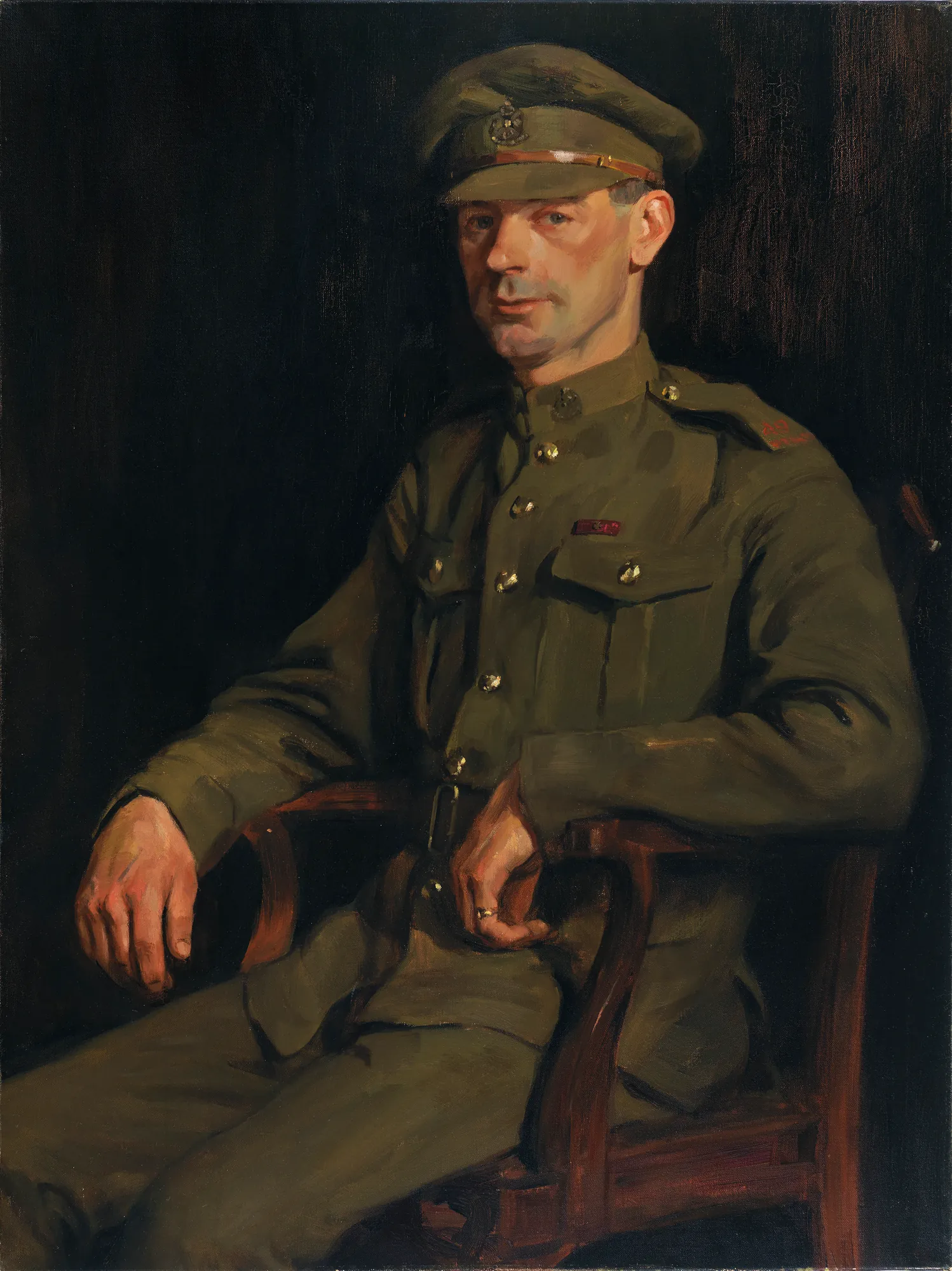John Chipman Kerr VC John Chipman Kerr VC by A. Y. Jackson. A three-quarter length portrait of a man in a Canadian military uniform seated in a wooden chair against a dark, neutral background.