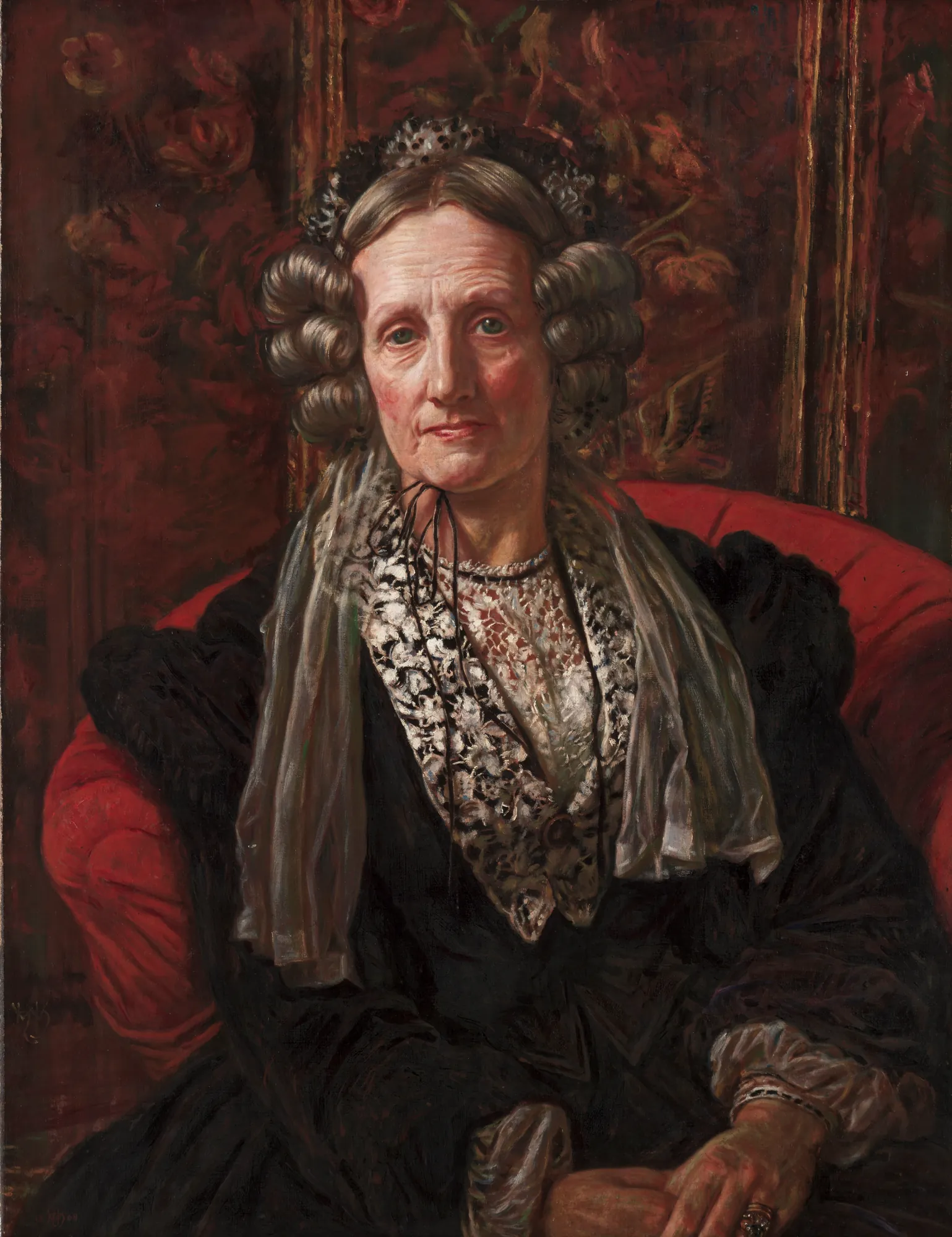 Mary Walker Waugh Mary Walker Waugh by William Holman Hunt. A half-length portrait of an elderly woman with silver hair in tight curls, wearing a black dress with intricate lace and a white veil, seated in a red armchair.