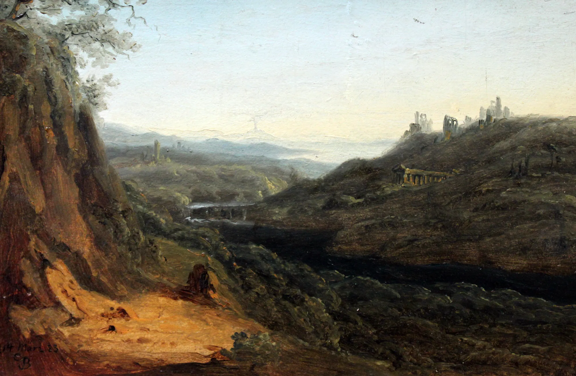 Ideal Mountain Landscape Ideal Mountain Landscape by Carl Blechen. A dark, atmospheric mountain landscape featuring craggy cliffs, classical ruins, and a winding river beneath a hazy, pale sky.