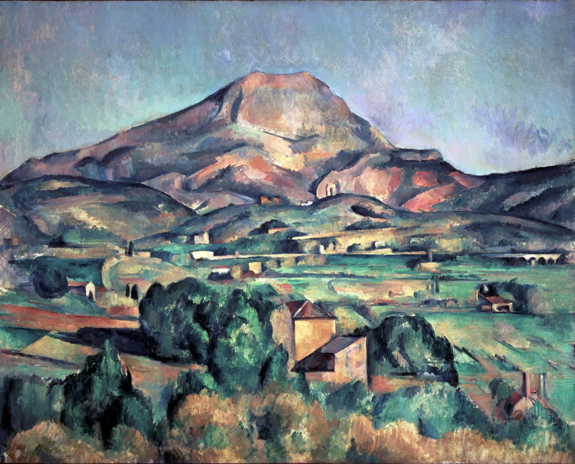 Mont Sainte-Victoire seen from Bellevue Mont Sainte-Victoire seen from Bellevue by Paul Cézanne. An oil landscape depicting a prominent mountain overlooking a valley of green fields, trees, and small buildings with structured brushstrokes.